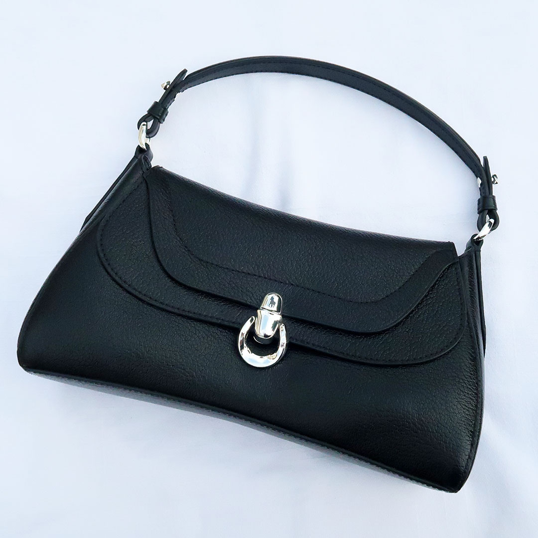 In love with this classic handbag which features a top handle and detachable shoulder bag. It has beautiful leather, suede interior and a fabulous design. Love! 

 #LTKOver40