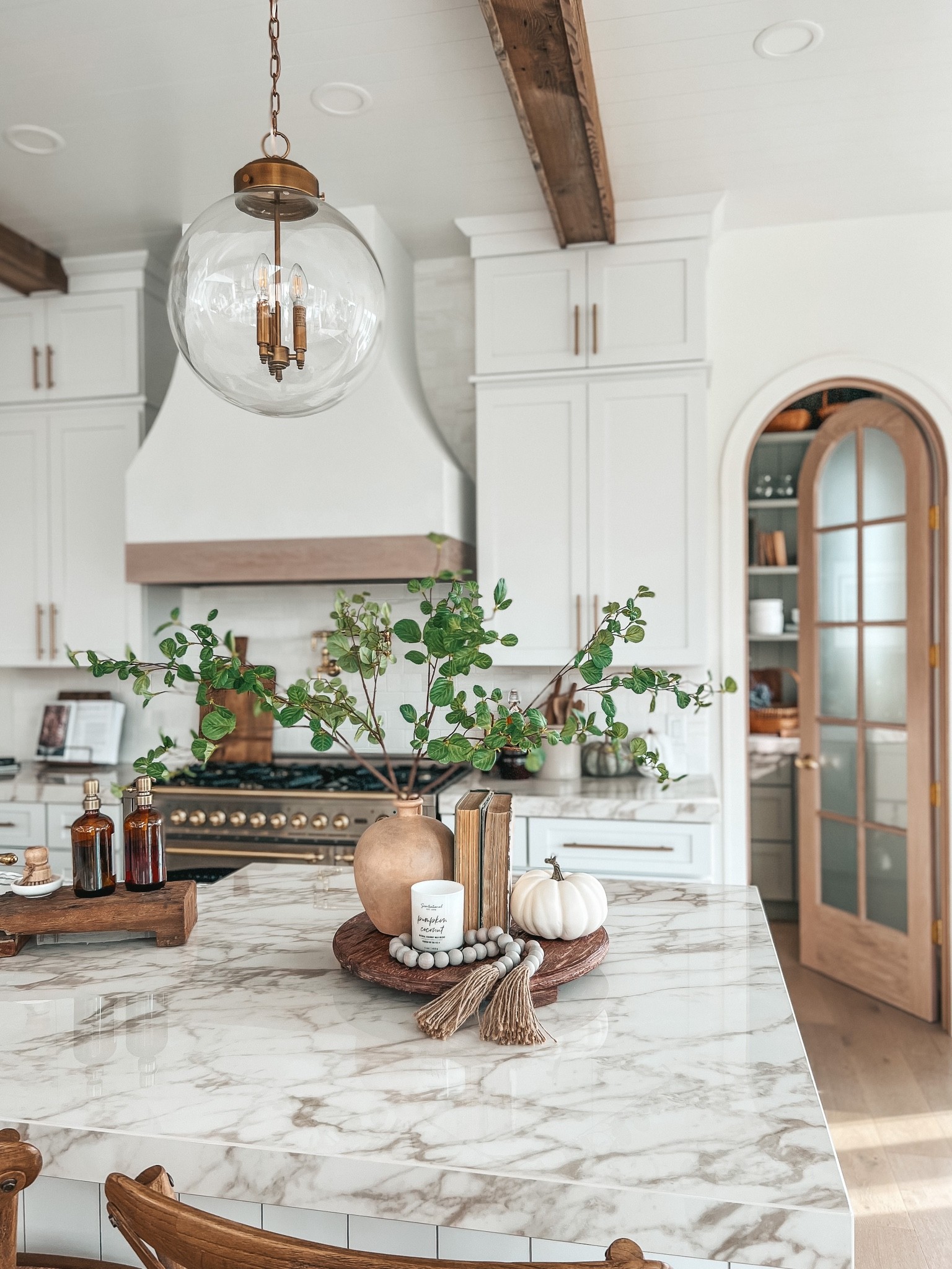 Shop my kitchen. My McGee & Co. pedestal and globe pendants are both 25% off right now!!! Pantry doors. 

#LTKSeasonal #LTKsalealert #LTKhome