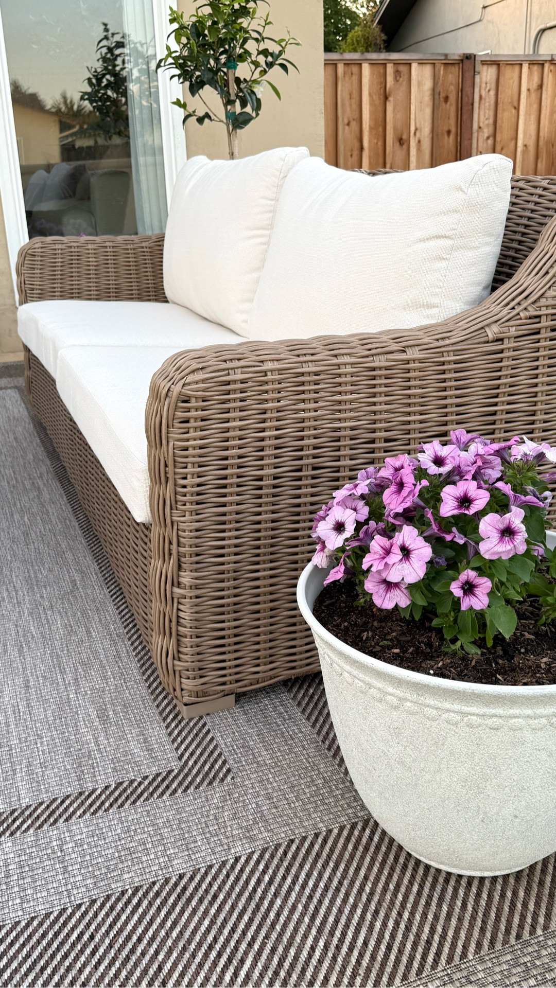 
The woven style, sloped arms, how the cushions attach to the frame—everything about this set is so great!! We are obsessed!! 

Slowly this space is coming together and we are doing so much more living outside! 

Follow along and share with a friend as we finish styling this area (adding pillows and coffee table decor). 

Patio Furniture | Outdoor Furniture | Patio Refresh | Patio Design | Home Decor | Home Styling | Transitional Style 
•
•
•
•

#outdoorfurniture #patiofurniture #outdoorliving homedecor #ltkhome

#LTKSeasonal #LTKSaleAlert #LTKHome