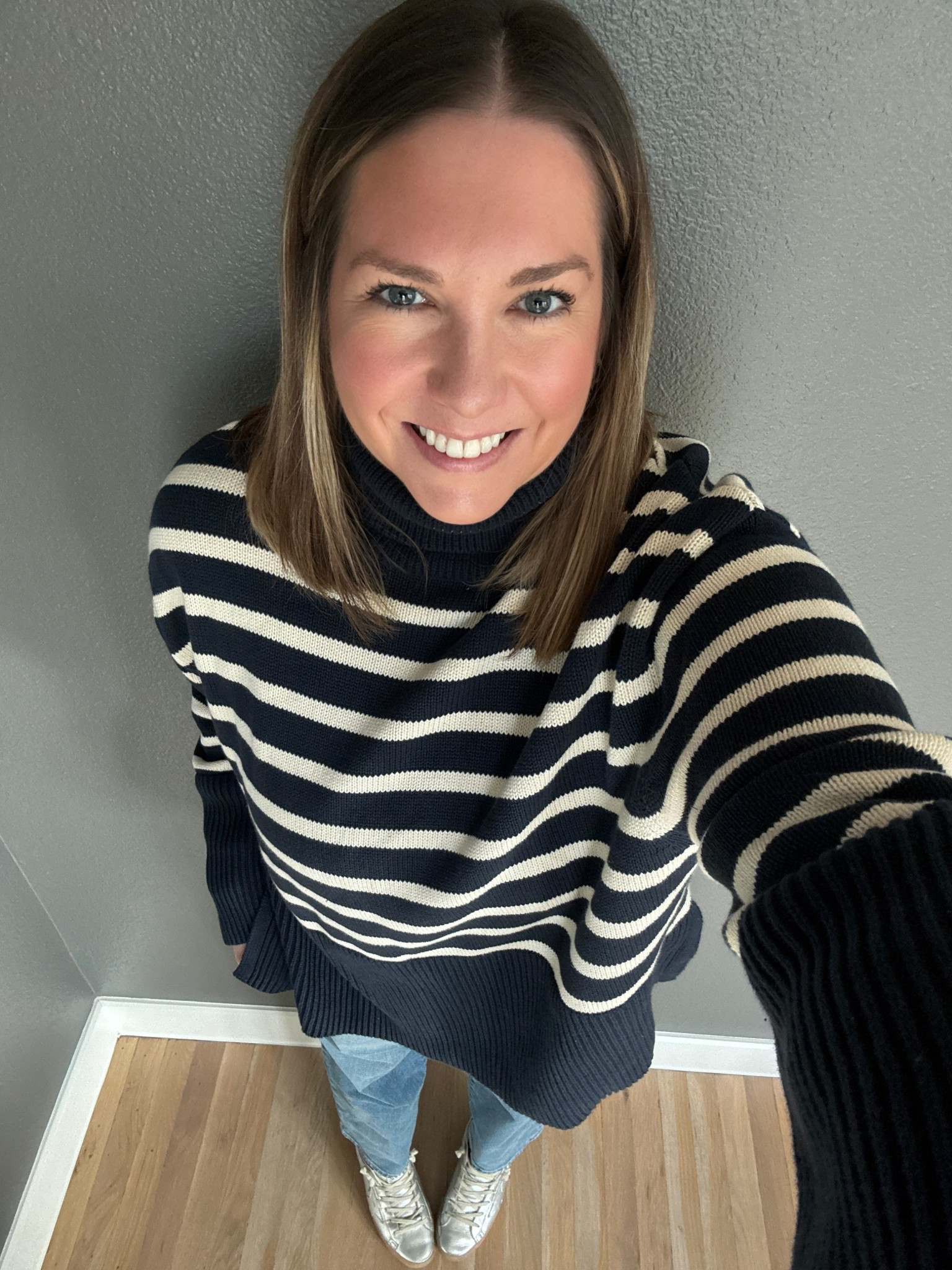 Still cooler weather so soaking up all the time to wear a sweater. I love the classic feel of this sweater. The stripes and turtleneck are so fun. Paired it with a simple jeans and silver sneakers to do some shopping  

#LTKMidsize #LTKFindsUnder50 #LTKootd