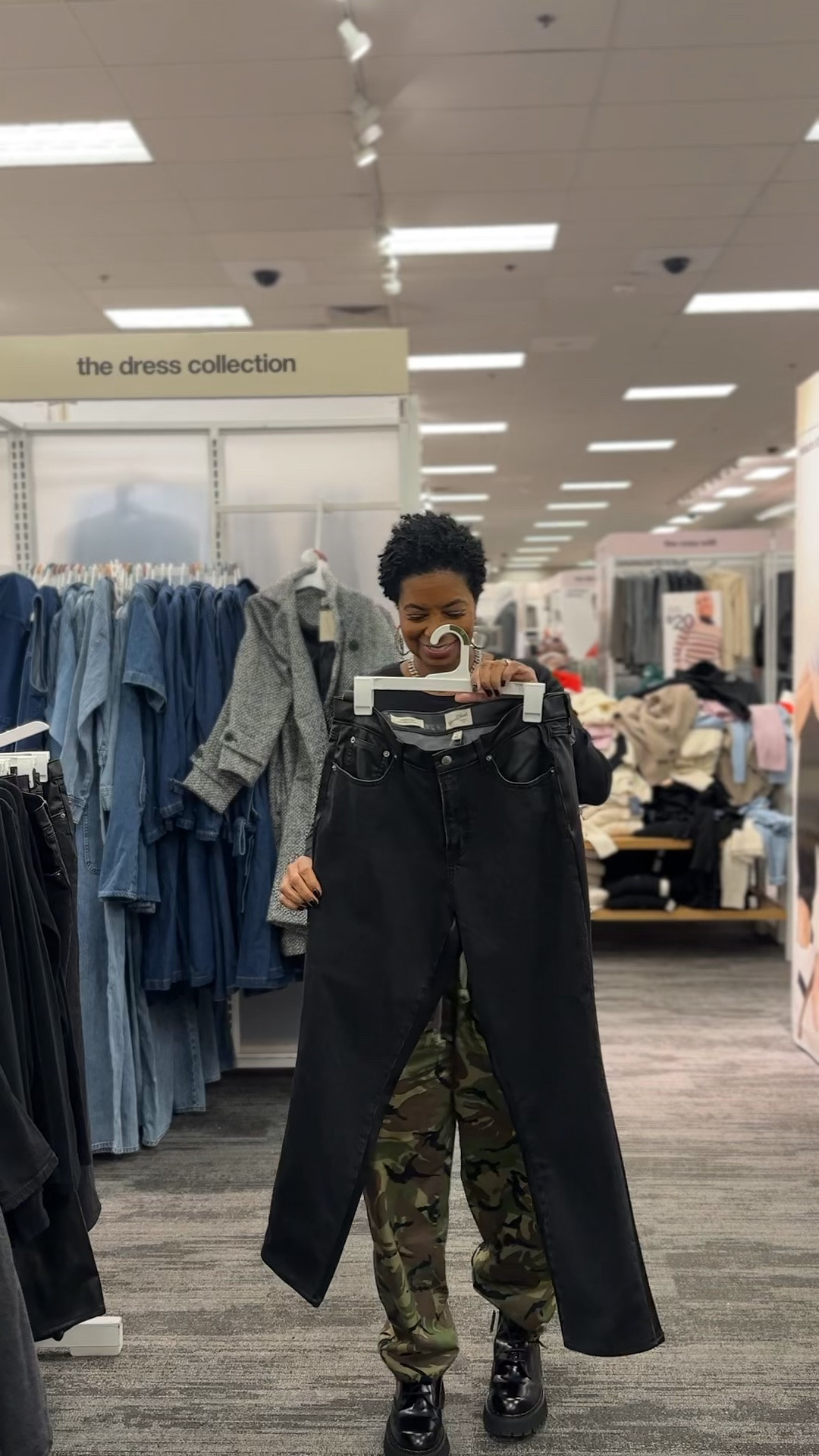 Jeans with faux leather on back. Cute black t shirt  