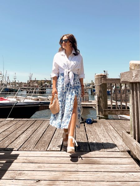 Take this fabulous blue and white floral midi dress with you wherever you go this summer! And you can tie a white button down like I did to create a two-piece look for another day. 

#LTKstyletip #LTKsalealert #LTKSeasonal