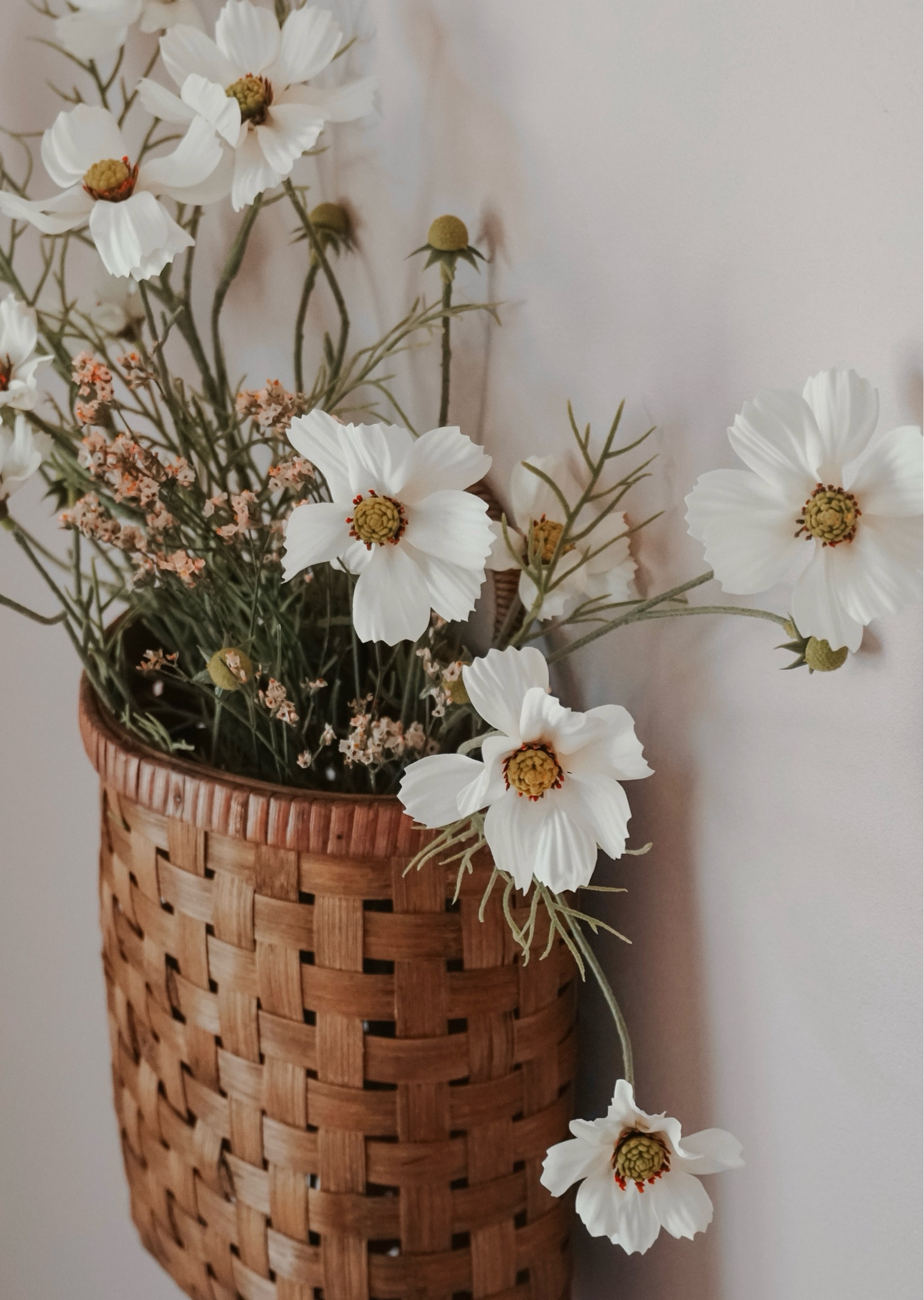 I got these beautiful faux flowers and hanging basket from Hobby Lobby, but I linked some very similar products! I love how it turned out! 

#LTKBeauty #LTKBaby #LTKHome
