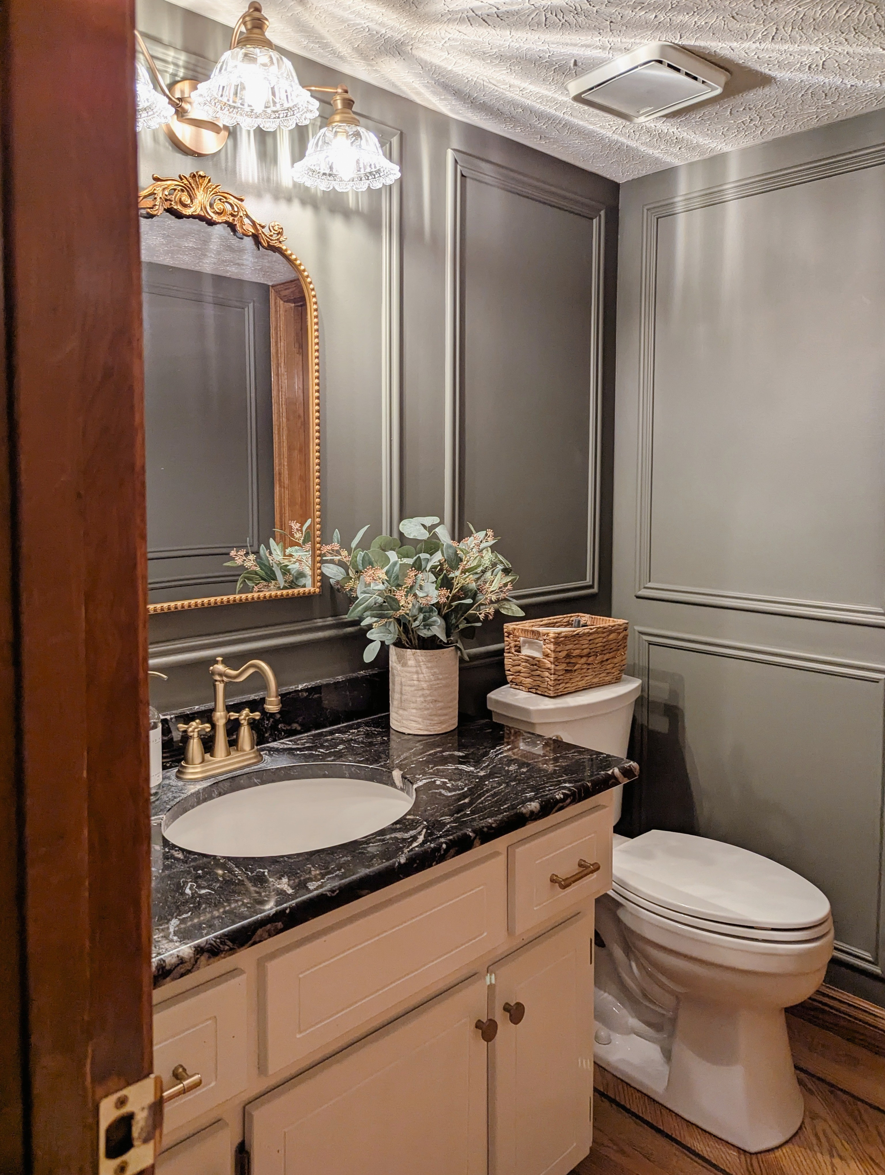 Guest Bathroom decor used in our remodel | Moody, vintage, antique guest bathroom accessories and decor. #guestbathroom #bathroomdecor #bathroom #vanitylight #vanity #vintagedecor #bathroomideas #antiquedecor

#LTKHome