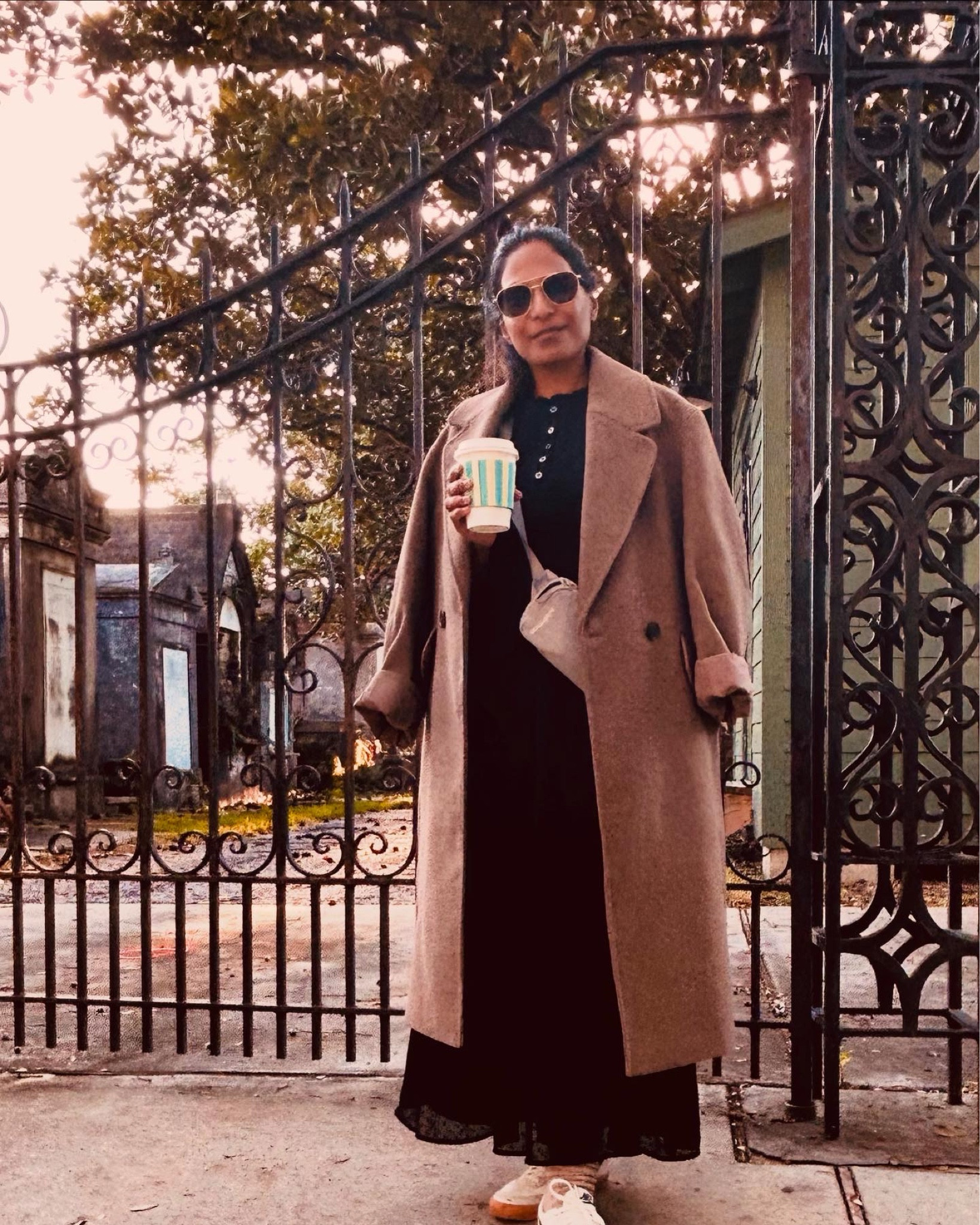 Hi everyone! Winter isn’t my favorite season but I do love coats, particularly long coats that play well with dresses, and look pulled together. This brown coat pairs well with everything and several people have asked me where I got it. The shoulders are strong but I don’t find them overwhelming even on my petite frame and the quality is really nice, especially when you consider the very affordable. (under $100) price point. It also washes and dries like a dream, which is a major bonus for me👍🏽