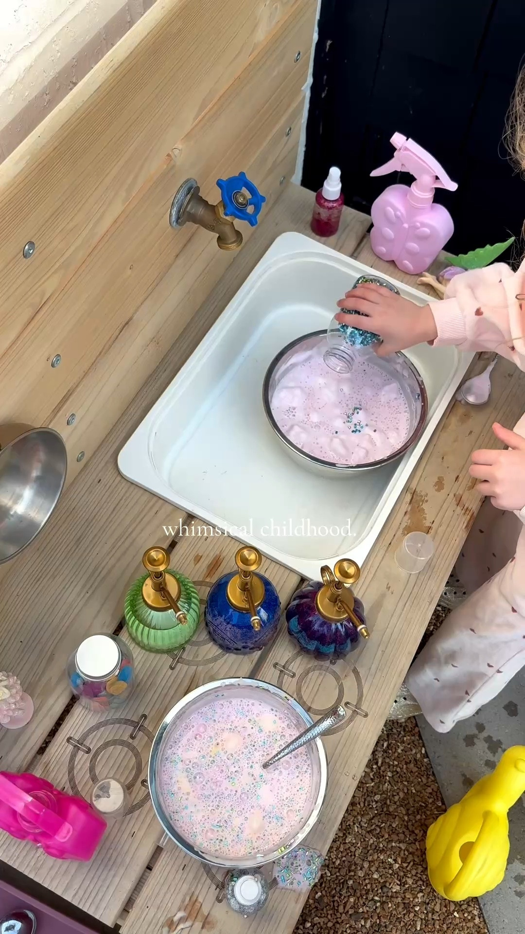 We love this outdoor kitchen and you can hook a hose up to it for a real working sink faucet! 