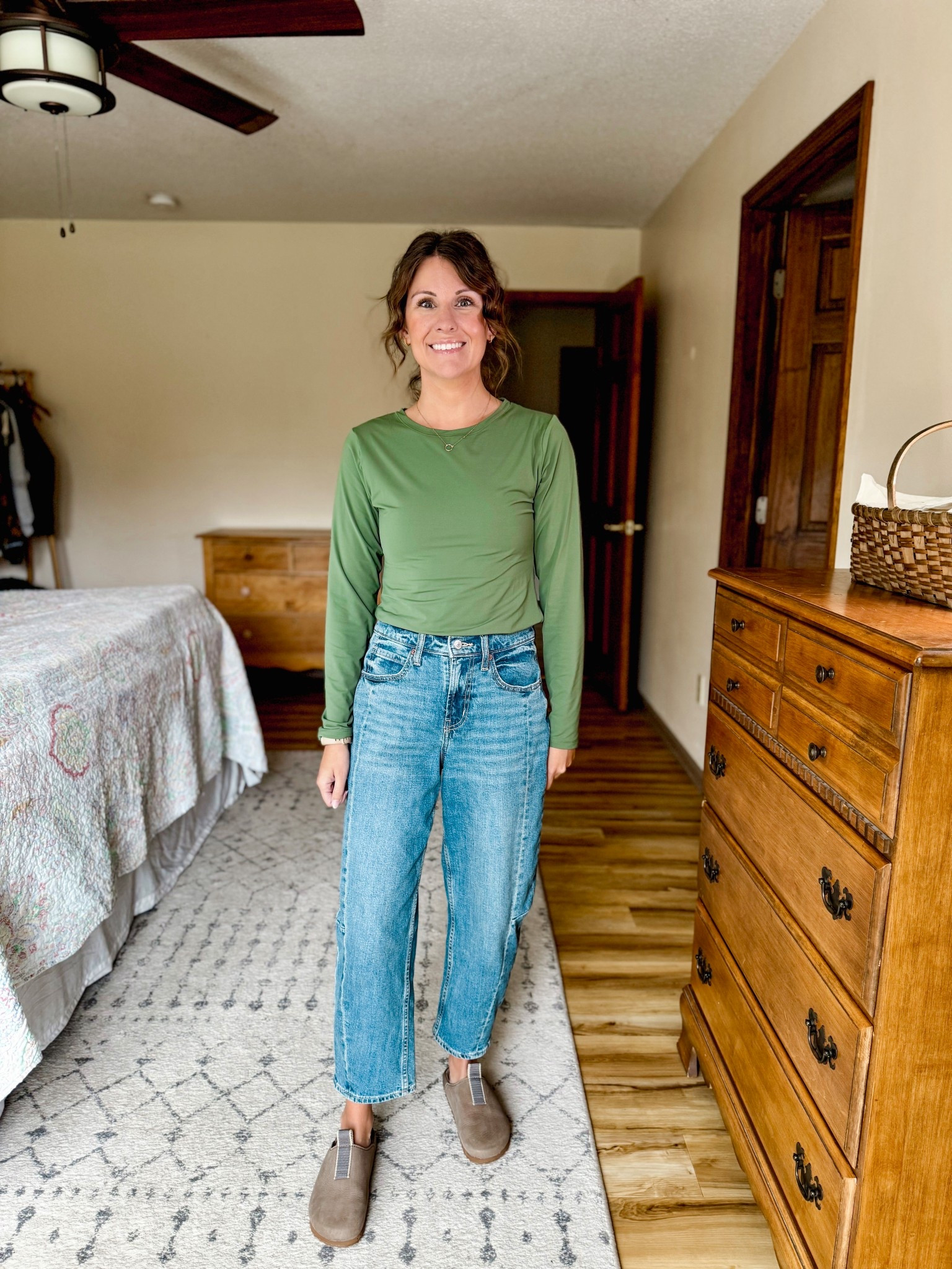 Wearing medium in my top and 0 short in my barrel jeans. My clogs fit true to size.