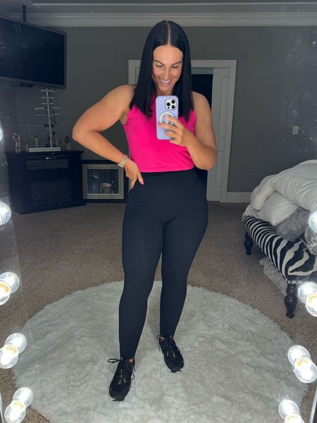 Friday travel fit; comfy and versatile. This top is great for exercise, lounging or even with jeans for going out. The leggings are the perfect length and have no front seam! Wearing a large top and medium bottoms. Could wear a medium top as well  

#LTKfitness #LTKstyletip #LTKtravel