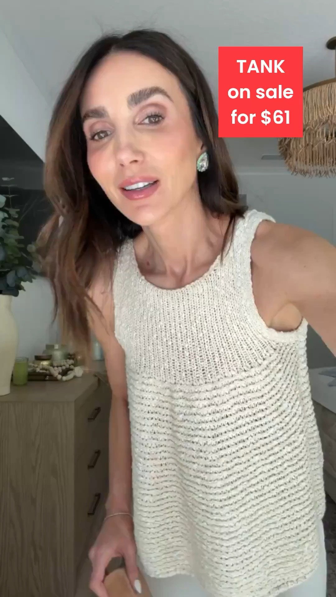 This knit tank is one of those pieces that looks designer without the full price tag, and it’s currently on sale for just $61. The textured knit gives it beautiful dimension, the relaxed swing silhouette is flattering without clinging, and it’s an easy piece to wear now with white denim and later layered under a cardigan this fall.

knit tank, sleeveless sweater, sale find, neutral top, white denim outfit, elevated basics, casual chic, fall transition outfit, designer look for less, timeless wardrobe, annabrstyle

#LTKootd #LTKSaleAlert #LTKOver40