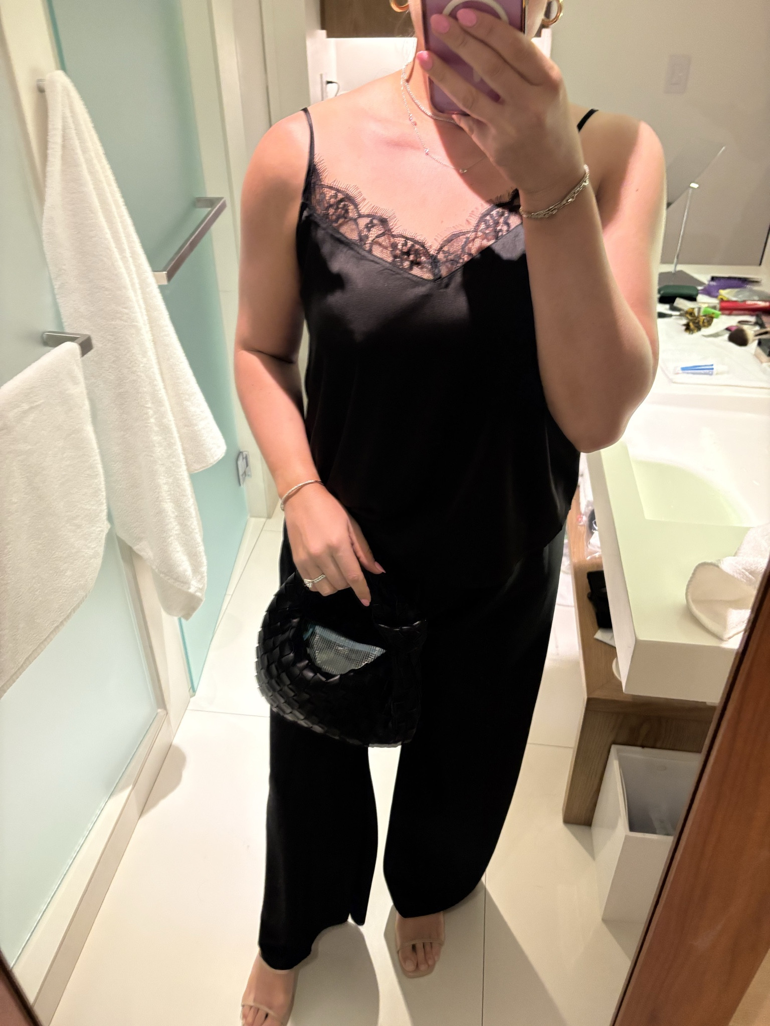 Into the satin pants trend - like pajamas but elevated. A simple cami makes this an easy go to outfit for vacation - will be wearing these all spring! 

satin pants / amazon fashion / amazon find / black outfit / resort /vacation / woven bag / purse  

 #LTKdayinmylife #LTKootd #LTKSaleAlert