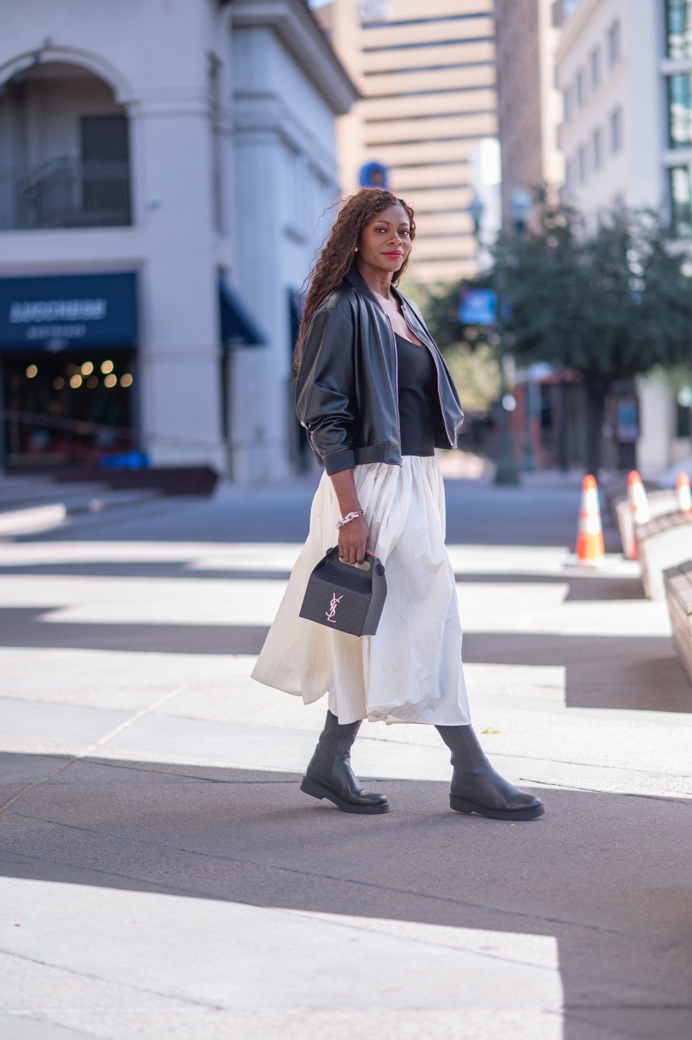 Shopped my closet with this dress drop waist dress found on sale at under $30 and styled it with the leather bomber jacket, boots and accessories elevating the dress! 
