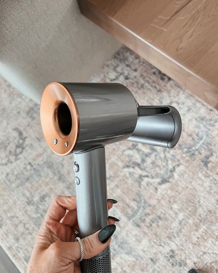 One of my favorite new things the Dyson Supersonic hair dryer blow dryer ..live the smoothing attachment it comes
With…shown here ..smoothed frizzies 

#LTKbeauty #LTKGiftGuide #LTKU