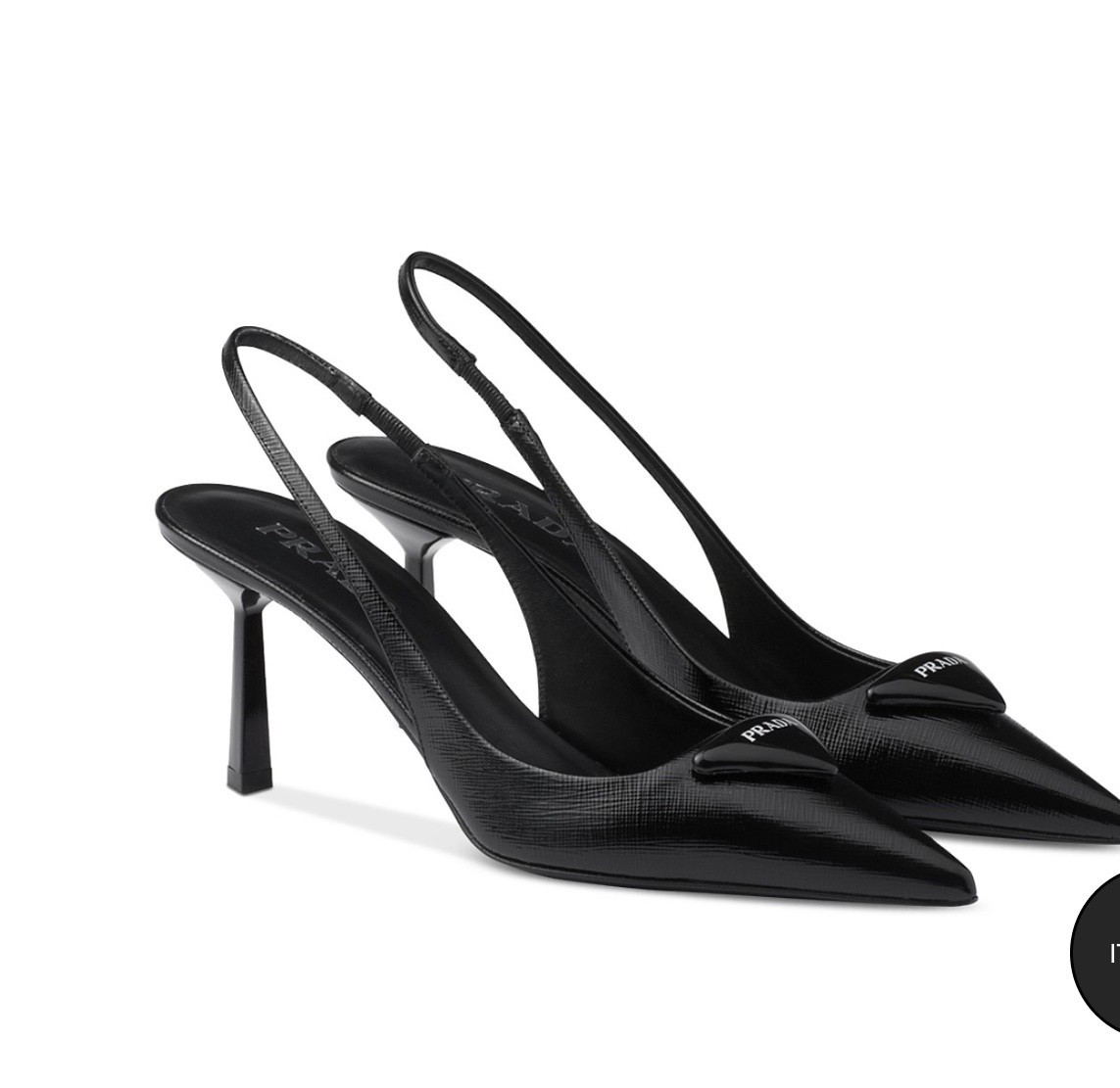 A timeless point-of-view: These Prada heels are crafted from Saffiano leather. The distinct crosshatch pattern gives way to a padded logo appliqué and a geometric heel for a look that embodies elegance.