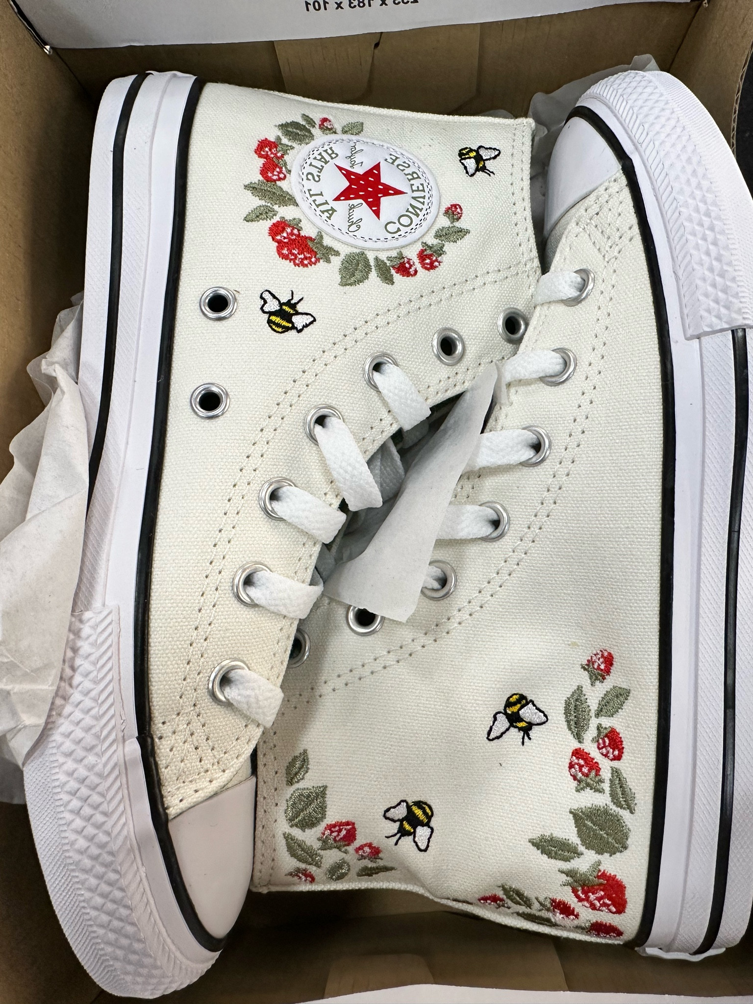 Converse store with bees