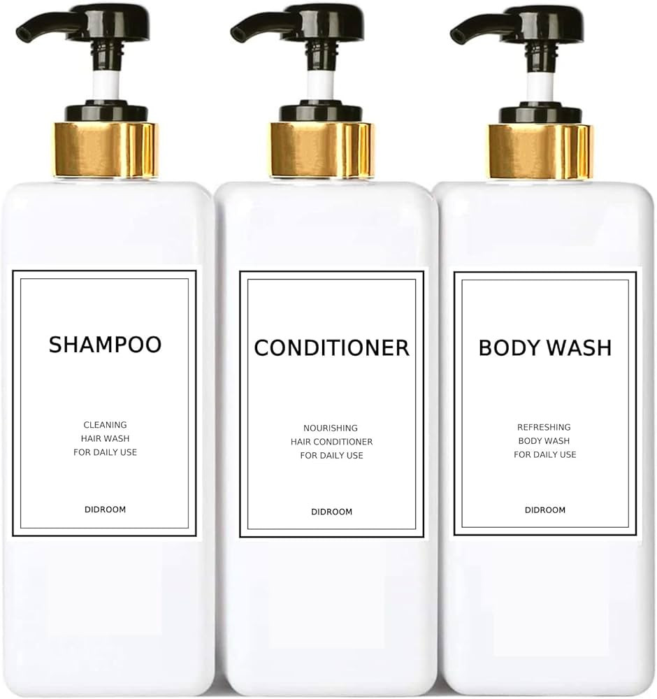 Modern Gold Shampoo and Conditioner Dispenser (21 oz, Pack of 3) Refillable Pump Bottle Set Empty... | Amazon (US)