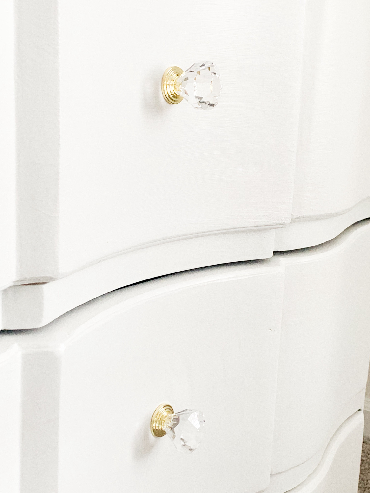 I painted my nightstands white and added these pretty crystal and gold knobs

Hardware
Cabinet hardware
Gold hardware
White nightstand 
Bedroom decor 

#LTKfindsunder50 #LTKhome
