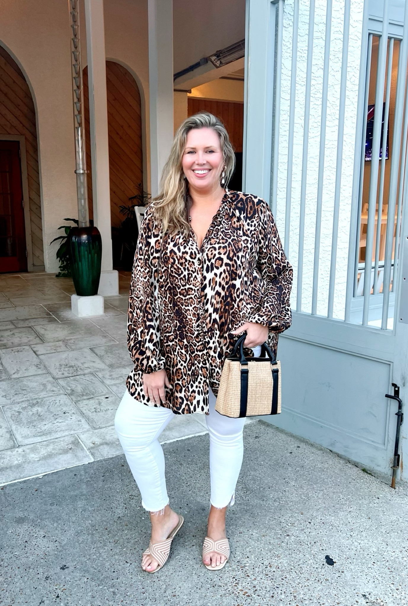 What I Wore: Beach Edition! This Show Me Your Mumu tunic (from the Heather McMahan collection) is one of my favorite investment pieces (2X). I can see myself wearing this for years to come, and yes… I consider leopard to be a classic neutral, ha! These white jeans are hands down, the best white jeans I’ve ever found. This exact pair is no longer available, but I’ve linked two options that are very similar. Good American can be tricky in sizing, but if there is stretch I’ve found that they fit true to size. So here, I’m wearing an 18. But there are instances where their denim is made with more rugged fabric and less stretch, in which I need to size up one sometimes two. This little handbag is so cute, I ended up wearing it all week! It’s simple and perfect. These Lane Bryant sandals are so versatile and, again, I’ve found myself wearing them with everything.

#LTKtravel #LTKcurves #LTKSeasonal