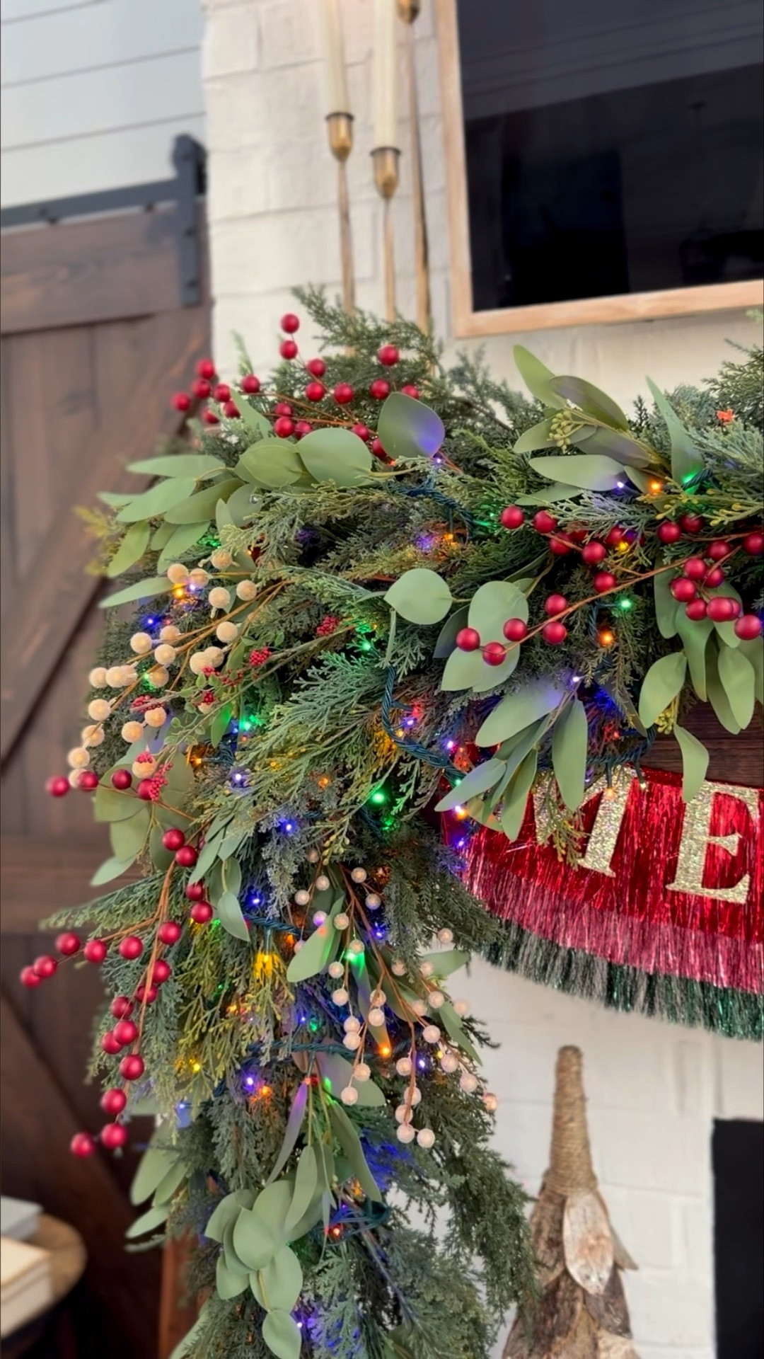 For my mantle this year I used three of the nearly natural cedar garlands and then put a target cedar and Cypress mixed garland on top of that. The exact target garland I have is no longer in stock, but I’ve linked a couple of similar options. Mixing garlands will always give you a fuller and more realistic effect! I added my lights next. Then to make it even fuller, I add in eucalyptus stems that I pulled apart from the garland I have linked and added in berry picks. My exact berry picks are from Hobby lobby. Also linking this tinsel banner that is so pretty and makes a statement! My mantle is almost finished. I can’t wait to show you guys the final result!

#LTKHome #LTKStyleTip #LTKHoliday