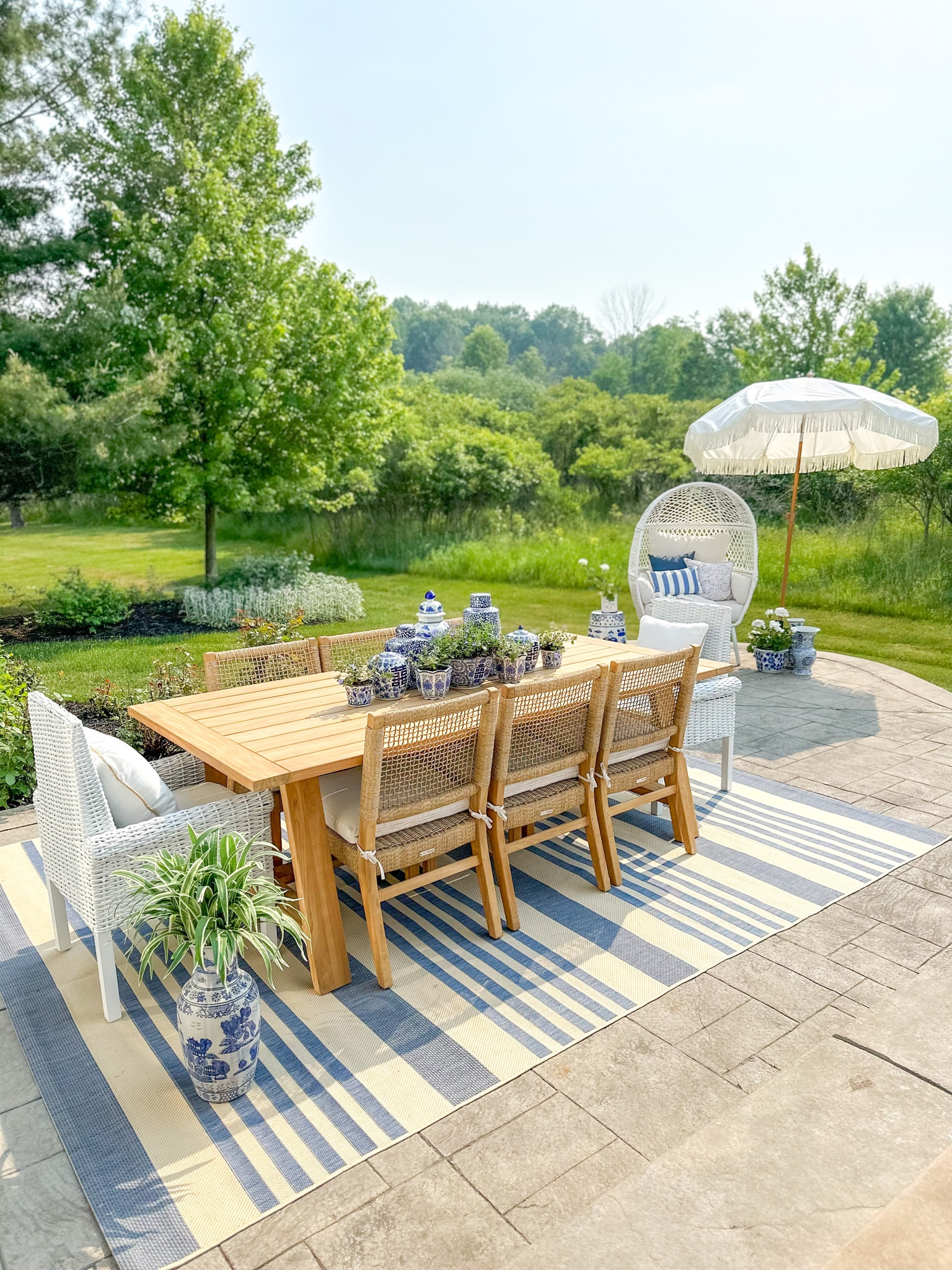 Shop my outdoor furniture and decor! 

Outdoor rug, outdoor table, teak dining table, blue and white decor, blue and white home, blue and white planters, chinoiserie, fringe umbrella, outdoor pillows, egg chair, chinoiserie planters

#LTKhome #LTKSeasonal #LTKGiftGuide