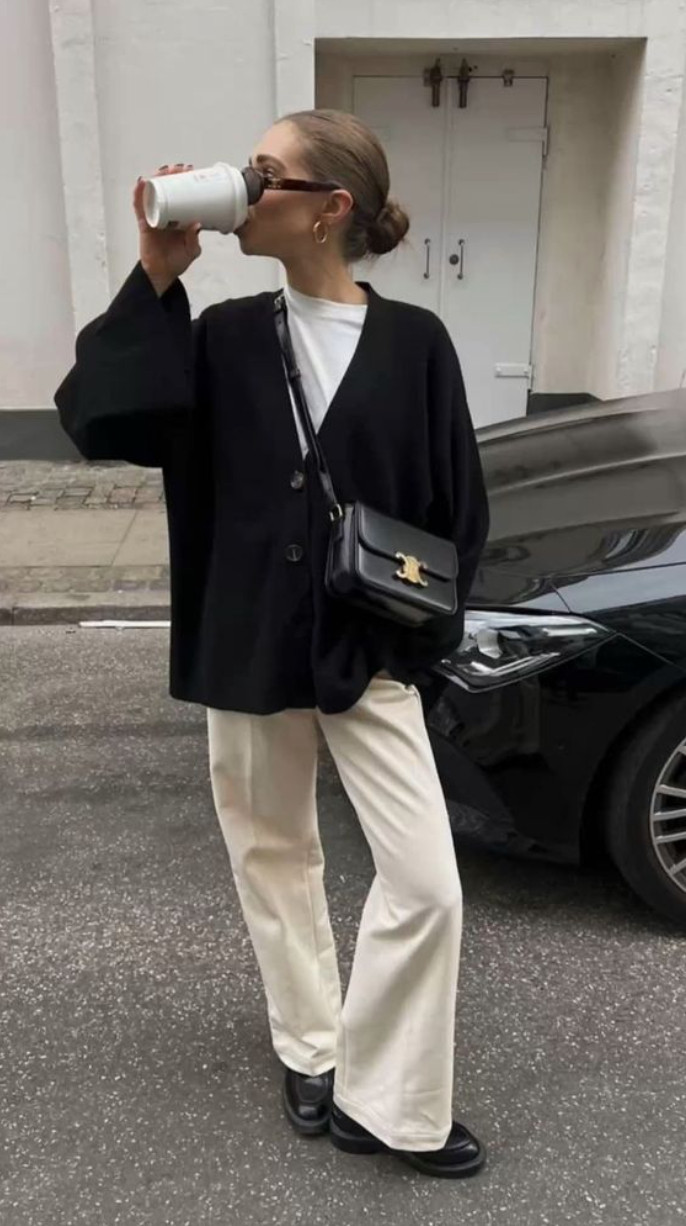 Elevated everyday outfit 🤍✨ I love a look that feels effortless but still polished, and this neutral black-and-cream combination is the perfect example. The oversized cardigan, tailored trousers, sleek loafers, and structured bag create such a timeless chic aesthetic that works for coffee runs, travel days, casual meetings, or everyday city style.

This is the kind of outfit formula that always looks expensive without trying too hard — simple pieces styled in a clean, intentional way. ☕🖤

#LTKStyle #EverydayStyle #MinimalStyle #ChicOutfit #NeutralFashion #CapsuleWardrobe #EffortlessStyle #OldMoneyStyle #StreetStyle #ClassicFashion #LuxuryInspired #CasualChic #OutfitInspo

#LTKootd