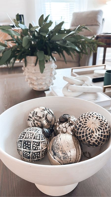 Simple holiday / Christmas home decor 

The pine branches are from ALFORAL but they are sold out on their site. I found some on Amazon and they are linked below 

#LTKSeasonal #LTKHoliday #LTKhome