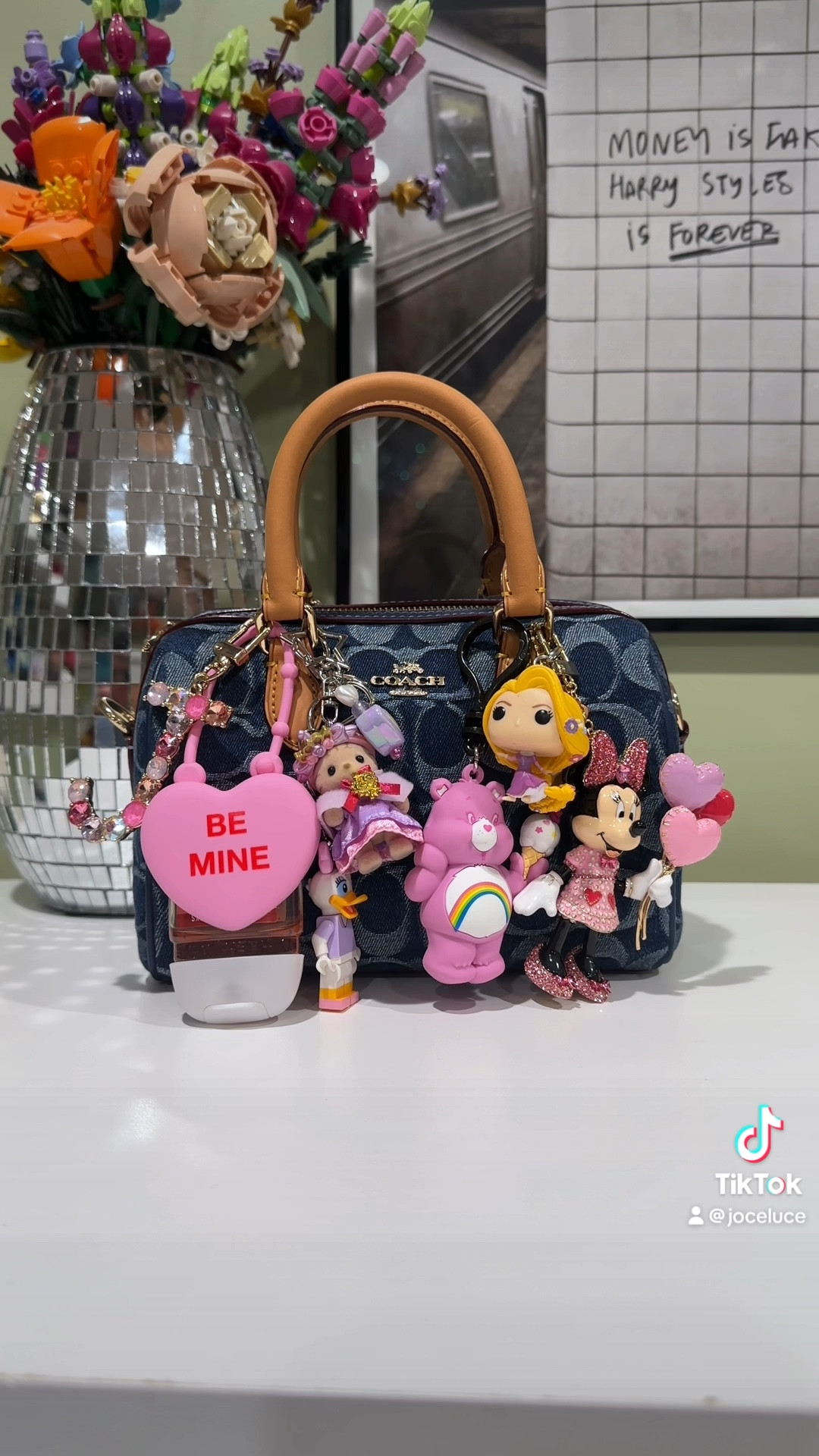 can’t leave the house without my charms!! 🧸👜 #coach #bagcharm #bagaccessories #keychains #carebears #minniemouse #baublebar #calicocritters #legokeychain

#LTKGiftGuide