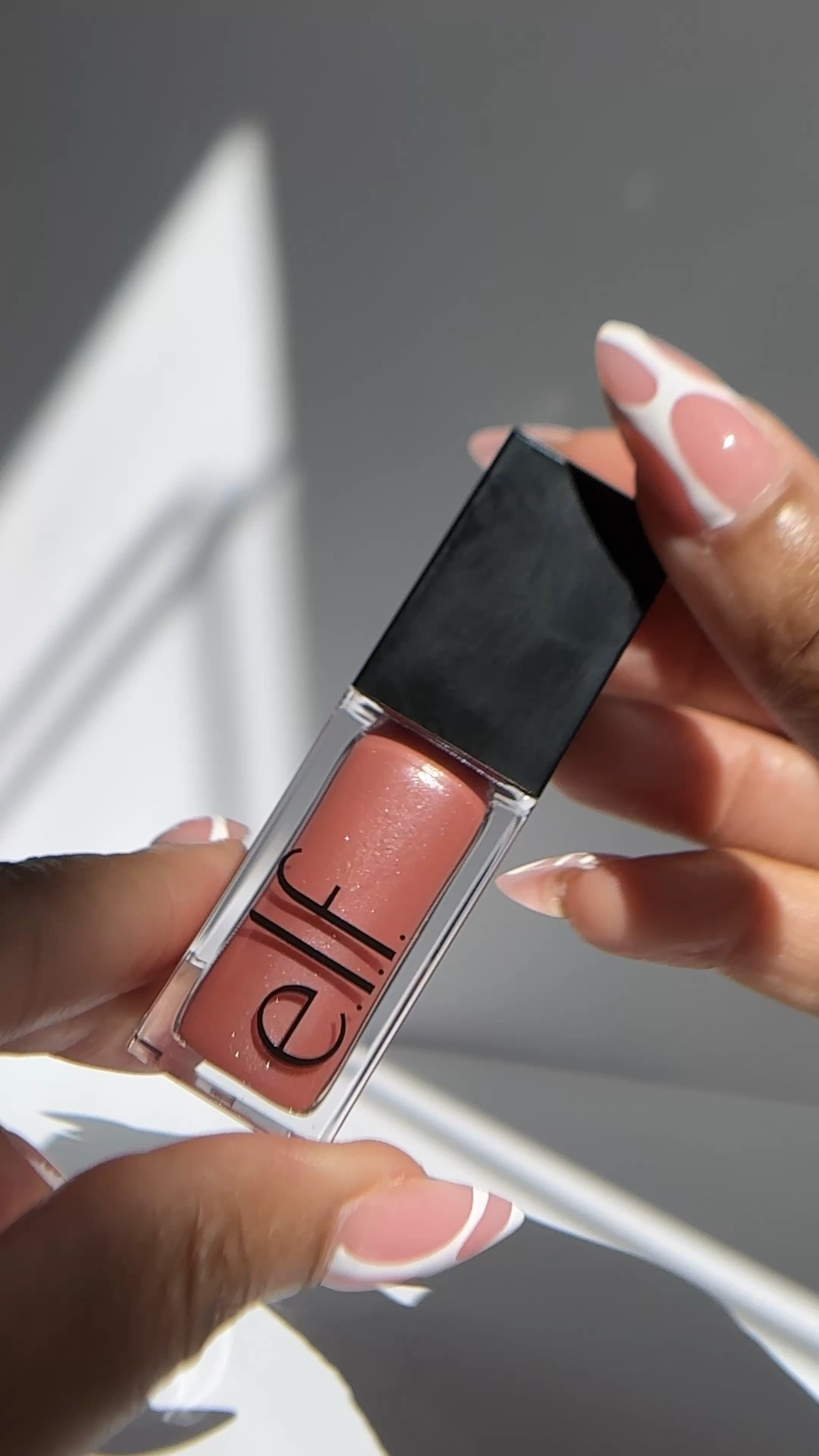 This e.l.f. Lip Oil is da bomb! 

Lip Color
Lip Gloss
Lip Oil