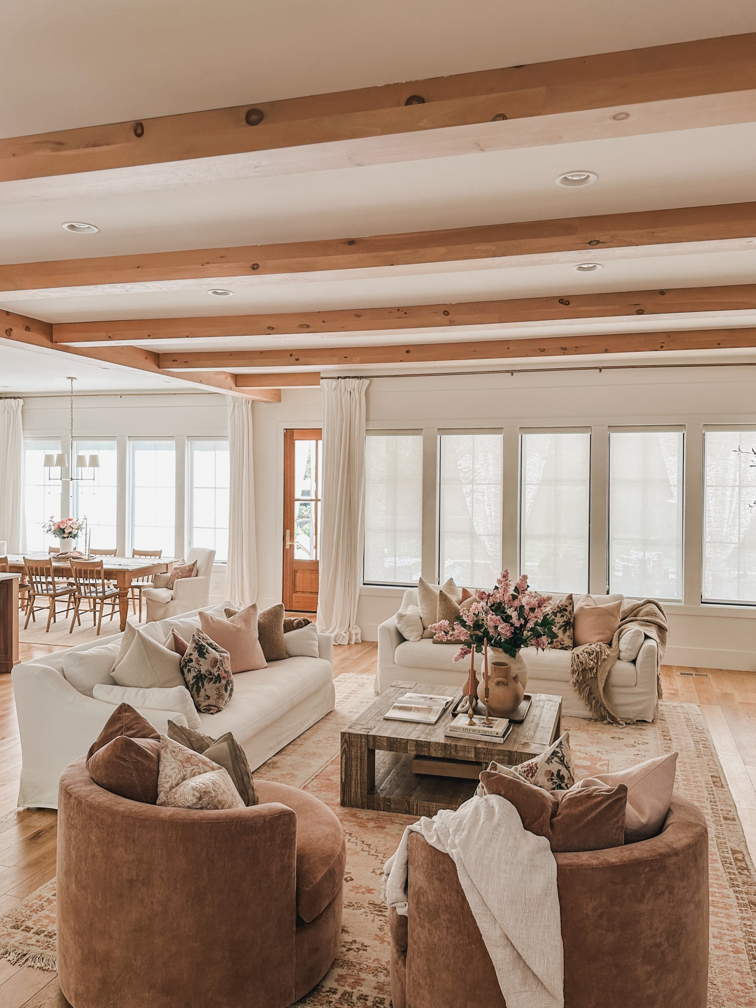 Brighten up your living room this summer with Pottery Barn’s light and airy designs in soothing neutral shades with pops of pink, seasonal textured pillows, and Rosewood swivel accent chairs. 

Living room refresh, summer refresh, Pottery Barn style, neutral wood tones, pops of pink, creamy whites, neutral area rug, coffee table finds, furniture favorites, faux florals, throw pillow, accent chair, curtain detail, living room views, light and bright, coffee table decor, throw blanket, neutral home, aesthetic finds, shop the look!

#LTKSeasonal #LTKStyleTip #LTKVideo