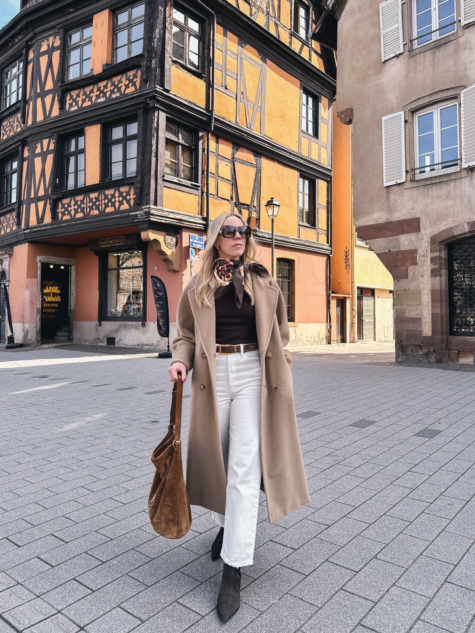 Spring outfit, European vacation look, Max Mara camel coat, silk scarf, @Levi's white ribcage ankle jeans, brown suede boots, YSL suede bucket bag 

#LTKSaleAlert #LTKTravel #LTKSeasonal
