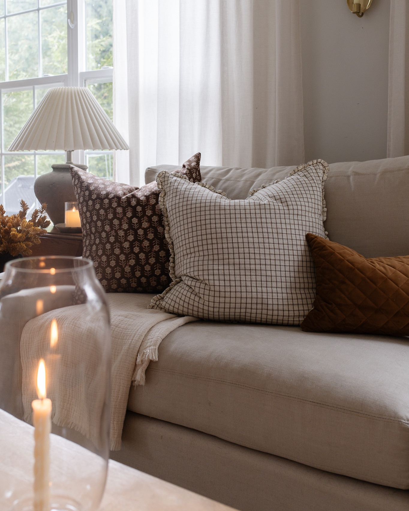 Living room decor ideas, throw pillows, sofa, table lamp

#LTKhome #LTKfindsunder50 #LTKsalealert