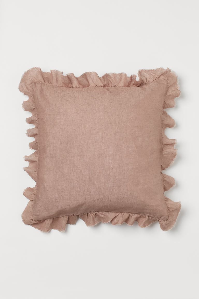 Premium SelectionCushion cover in linen with ruffled, raw-edge trim. Concealed zipper at back.Wei... | H&M (US + CA)