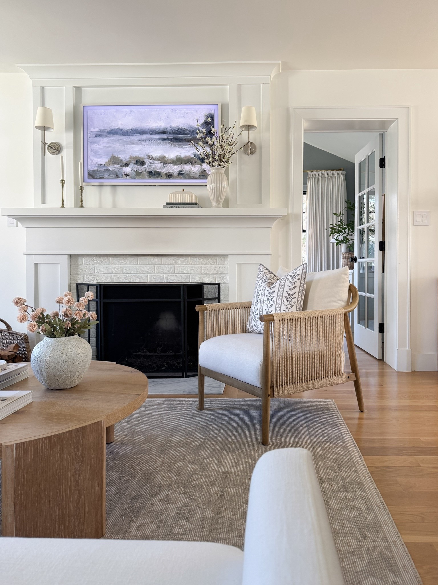 Love my woven acccent chair, new vase from Target, and this designer look for less neutral block print pillow cover

#LTKHome #LTKdayinmylife #LTKSaleAlert