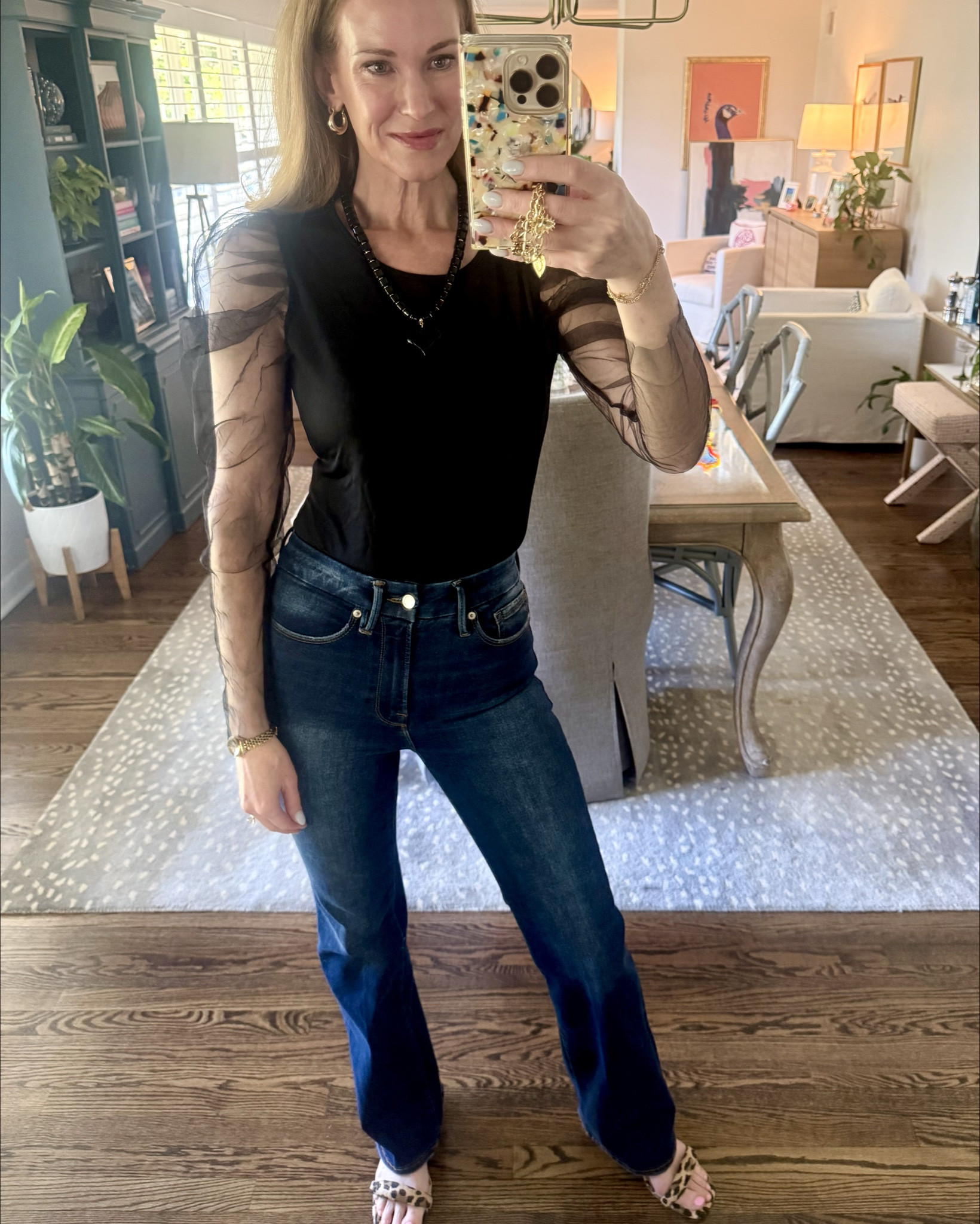 I saw a similar top on a friend but it was $$$ so I searched the image and found one just like it on Amazon! I love the fun sleeve detail! And wearing my Good American jeans that are so slimming and flattering! 

#LTKOver40 #LTKTall #LTKootd