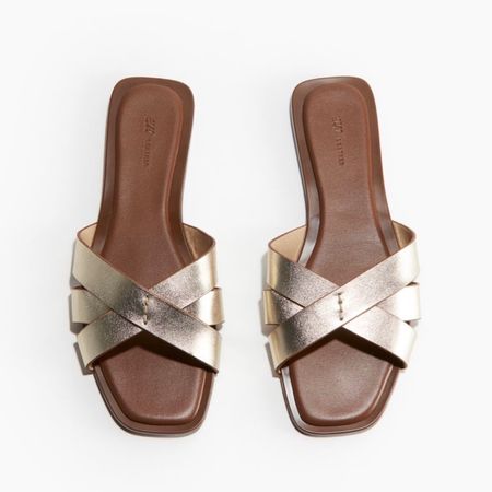 Gold leather slide sandals 

#LTKfindsunder50 #LTKstyletip #LTKshoecrush