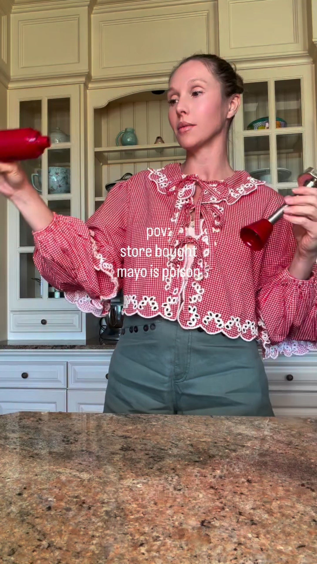 Making homemade mayo in red gingham blouse with scallop collar and tie front bows.

#LTKmomlife #LTKootd
