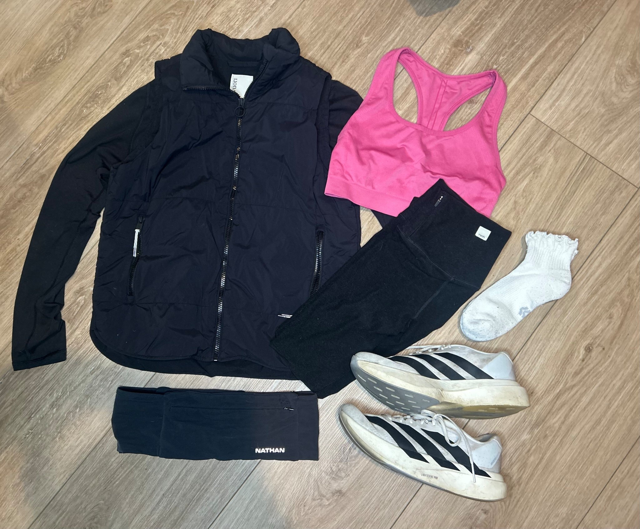Long run layout!! Chilly in the dark so I always layer with my Vuori Canyon Insulated Vest. Keeps me warm enough but super lightweight to not feel bulky or in the way! Socks are also stylish but still a running sock so perfect to protect from rubbing. I also love the Vuori Clean Elevation legging for the material as well as the zipper pocket in the back for my phone or my gels!

#LTKActive #LTKvlog #LTKfitnessgoals
