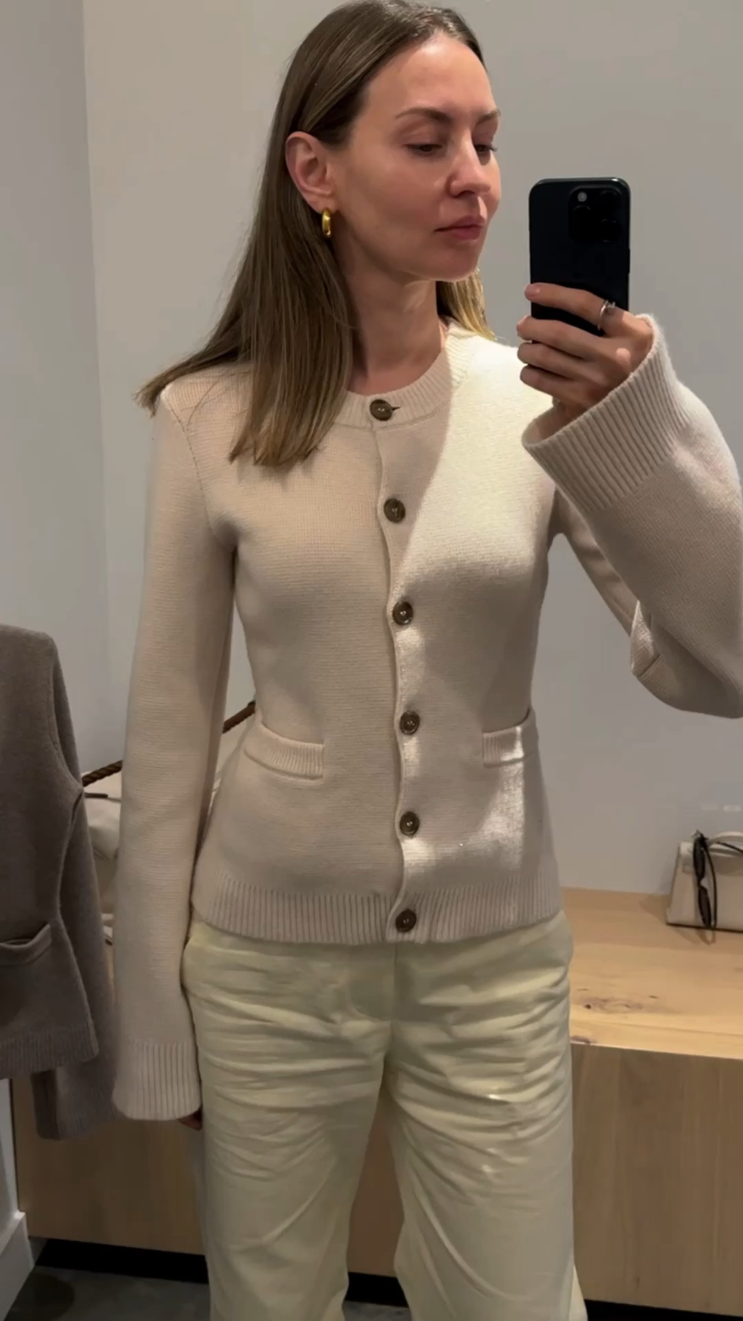 Khaite Scarlet cardigan dupe.


Jenni Kayne cardigan is super soft, the color is elegant and sophisticated. It is fitted so buy your usual size or even go smaller. I am an oversize fit lover but this particular cardigan does not look good when you Size up.


I am wearing size XS. It hugs the body. My waist is (25.5-25.9 inches, bust 34.6 inches. I usually wear size Small). Please see another video in another color where I will show how S looks like on me.
 
Honestly this was my least favorite color. It has a tad of pink in it. It is not purely white. And light color shoes all the imperfections-it does not look as expensive as other color variations.

#LTKstyletip
