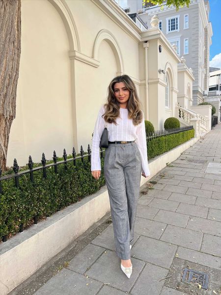 White long sleeve striped tshirt, formal grey wide leg trousers, point toe heels, black shoulder bag. Transitional outfit, autumn outfits, fall outfits. Lily silk, modest fashion 

#LTKstyletip #LTKeurope #LTKSeasonal