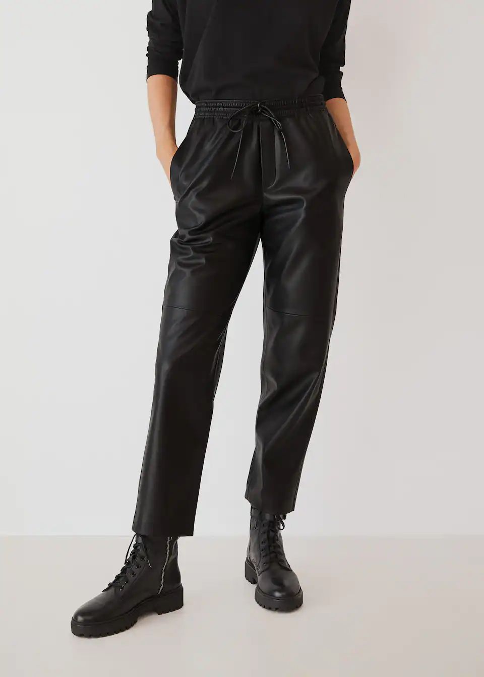 Leather-effect elastic waist trousers | MANGO (US)