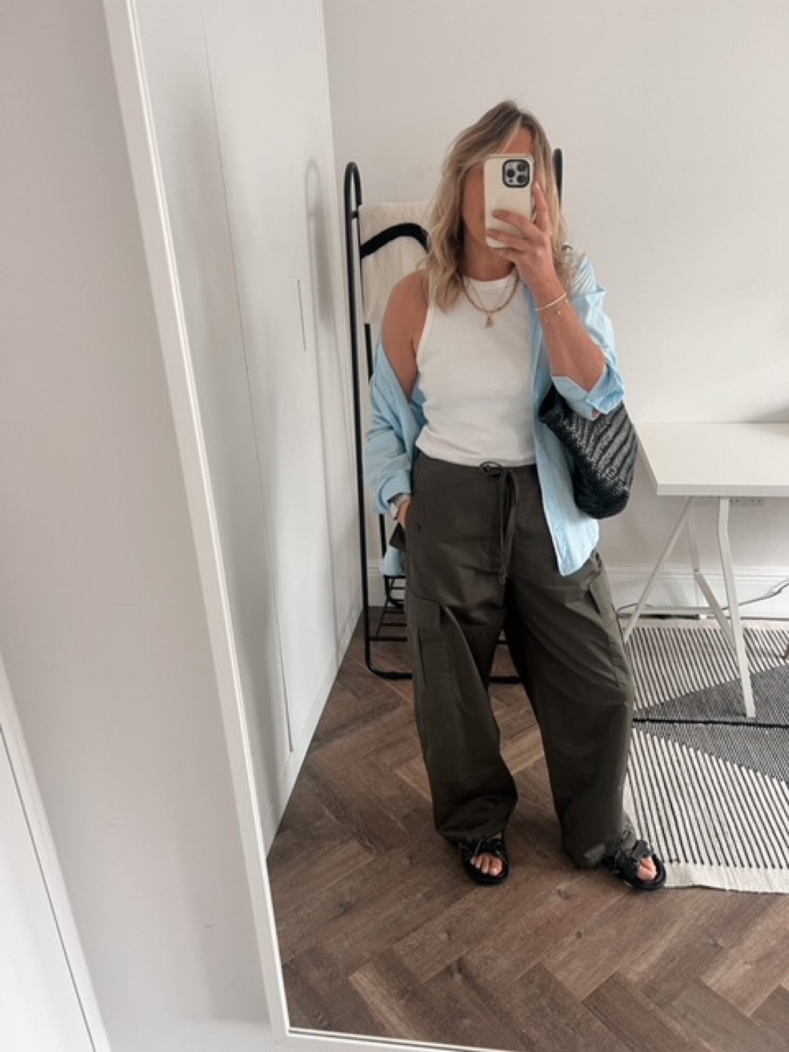 White ribbed top, white vest, blue shirt, summer shirt, khaki cargos, straight leg cargos, dad sandals, Velcro sandals, padded sandals, dad sandals, black bag, weave bag, shoulder bag, gold necklace, pendant necklace, Mango, Boden, Arket, Nobody’s Child, Anthropologie, Missoma, Coggles

#LTKeurope #LTKstyletip #LTKSeasonal