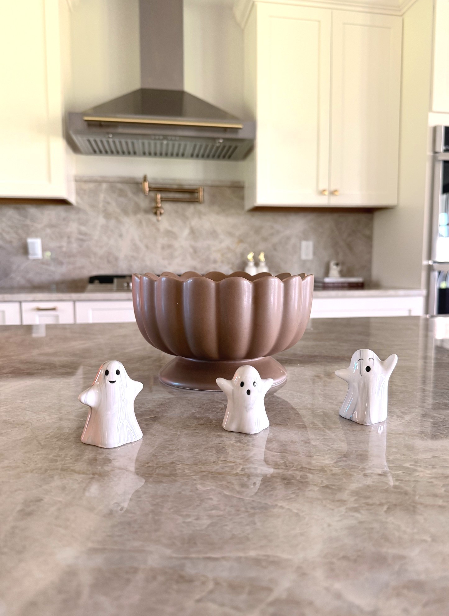 The only thing that’s better than the way this candle smells? The way it looks in this scalloped ceramic jar! And the three little ghost guys in front? Spooky cute 💕👻

#LTKHome #LTKSeasonal #LTKautumn
