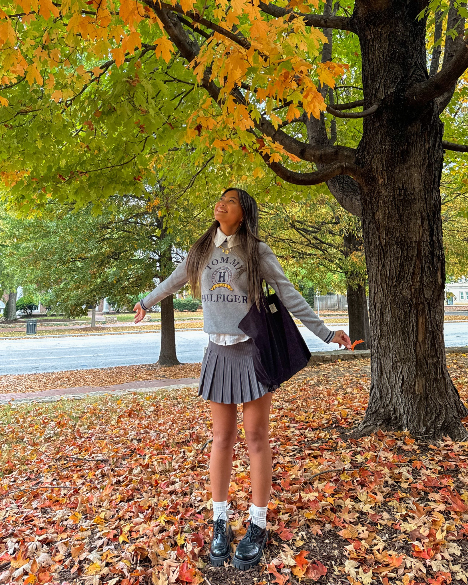 fall ootd 🍁 tommy hilfiger crewneck sweater was purchased 5+ years ago so I linked some similar styles. I layered the sweater on top of a white short sleeve button up and paired it with a pleated skirt. My black loafer shoes and tote bag are sold out styles so I linked some similar products to complete the outfit <3

#LTKItBag #LTKSeasonal #LTKHoliday