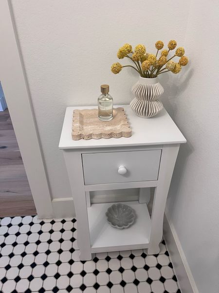 Love how this little corner came together in powder bath. This scallop tray is on major sale 🏷️. Accent table comes in 3 colors  

Pleated vase / small case / scallop travertine tray / stone tray / room spray / marble dish / amazon / 

#LTKstyletip #LTKsalealert #LTKhome