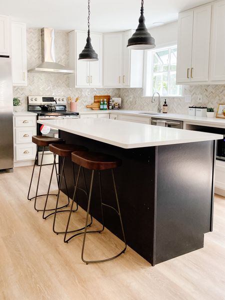 Wooden counter stools are a timeless choice for island seating!
.
.
.
Wooden Barstools 
Saddle Barstools 
Counter Stools 
Industrial 
Modern 
Farmhouse 
Black Island
Sleek Design 
Two Tone Kitchen Design

#LTKhome #LTKstyletip #LTKunder100