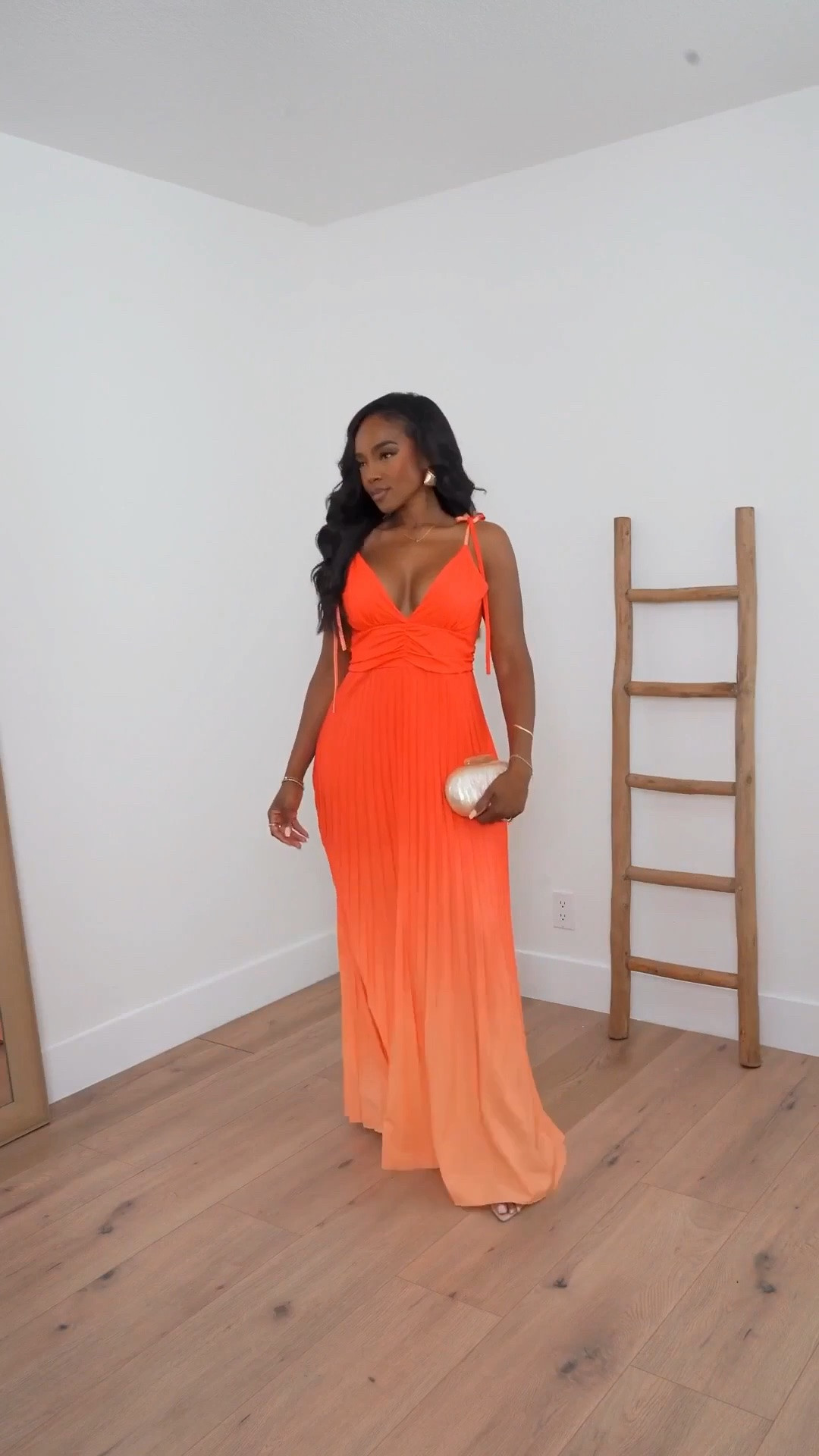 Hi Babes!

Okay this coral maxi dress is the definition of vacation glamour. The vibrant color, flattering ruched bodice, and flowy pleated skirt make this one of those dresses that instantly makes you feel beautiful the moment you put it on. It's bold, feminine, and guaranteed to turn heads.

If you're petite and curvy, this dress is incredibly flattering because the gathered waist creates beautiful shape while the flowing skirt elongates the body. The bright coral shade looks stunning on every skin tone and photographs beautifully for vacations and special events.

Where to wear this:
• Destination weddings
• Resort vacations
• Beachside dinners
• Summer weddings
• Cruise vacations
• Tropical getaways
• Special celebrations

Undergarments: Nude adhesive bra cups and seamless nude brief for the smoothest fit.

Everything is linked below.

xx Kira | IG: KirasFashionFinds

34D - 27 - 40 • Size Small or 4

Follow me on Instagram and YouTube @kirasfashionfinds