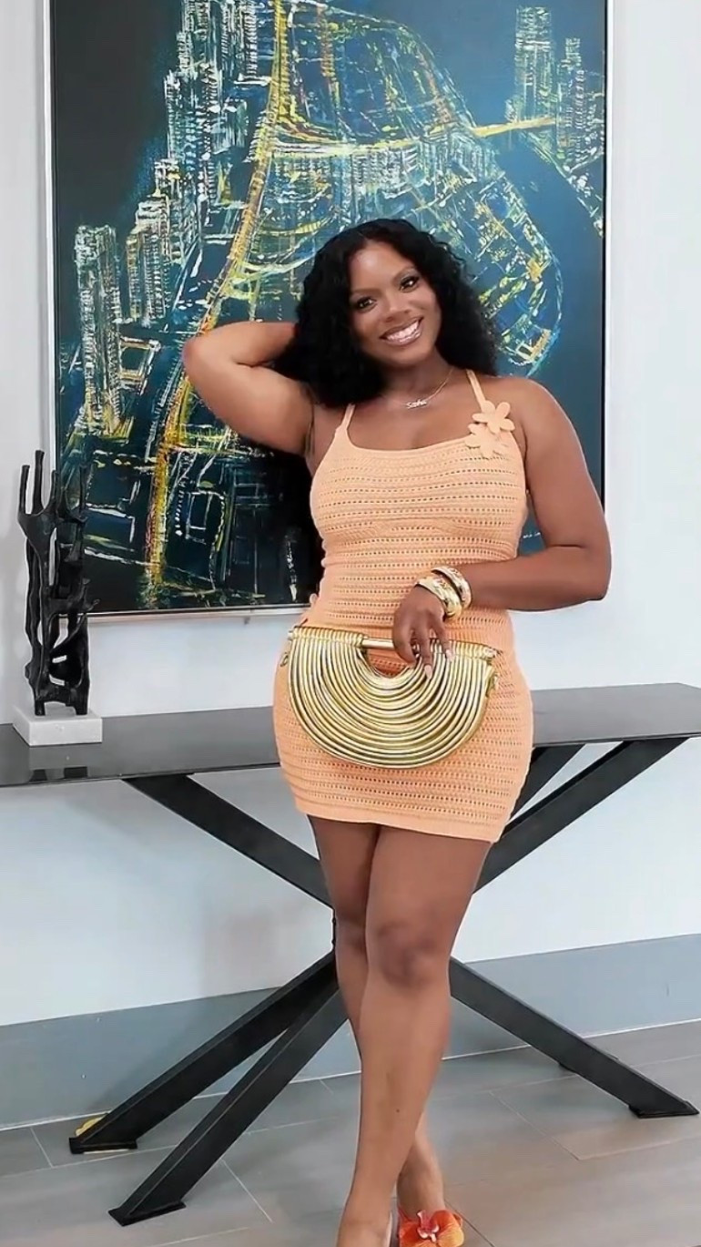 Here’s a caption that fits your style:

Serving sunshine with a side of confidence. ☀️🍑 This little crochet moment had me feeling cute from every angle. The color, the texture, the accessories… everything just came together. Sometimes all you need is a fun dress and a reason to step outside looking good. 💛

#SummerStyle #VacationOutfit #StyleInspo #BlackGirlLuxury