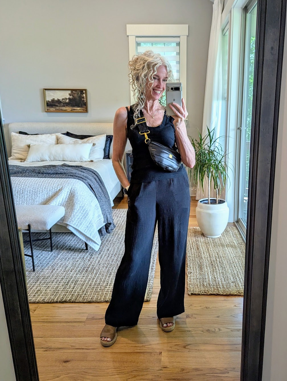 It hit the 90s today but these gauze pants felt cool and breezy. Paired with a black tank for a jumpsuit vibe. They come in 4 colors, wearing XS 

 #LTKOver40 #LTKFindsUnder50 #LTKStyleTip