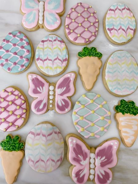 Springtime makes my heart flutter 🦋 Tried some new Easter Sugar Cookie designs this weekend with my favorite pastel colors. See icing + sugar cookie recipe below! The Butterfly was inspired by @southstreetcookies who is an incredible cookie baker (and also from Iowa 💗)

ICING / FROSTING RECIPE:

Beat:
3 TBSP Meringue Powder
1/3 cup to 1/2 cup Warm Water (Until frothy)

Add:
4 Cups Powdered Sugar (Slowly until glossy)

Add:
Vanilla to taste and more water if the icing is too stiff.
This dries pretty fast (within 5-10 minutes)

MY GRANDMA BETTY’S SUGAR COOKIE RECIPE:

1 Cup Soft Butter
11/2 Cups Sugar
2 Eggs
1 Cup Sour Cream
11/2 TSP Vanilla
41/2 Cups Flour
1 TSP Salt
1 TSP Baking Soda
1/2 TSP Nutmeg

Cream butter and sugar till fluffy, add eggs and beat well. Add sour cream and vanilla, blend well. Add dry ingredients. The dough will get quite soft. Chill for several hours or over night. Roll to 1/4 inch thickness, cut, (sprinkle with sugar if you don’t plan to frost), and bake at 375 for 8-12 minutes just until some edges get barely golden. Undercooked is better than overcooked!

#easterrecipe #eastercookies #eastersugarcookies #sugarcookies #sugarcookiesofinstagram #sugarcookiedecorating #royalicingcookies #royalicing 

Follow my shop @fivefootfeminine on the @shop.LTK app to shop this post and get my exclusive app-only content!



#LTKhome #LTKSeasonal #LTKparties