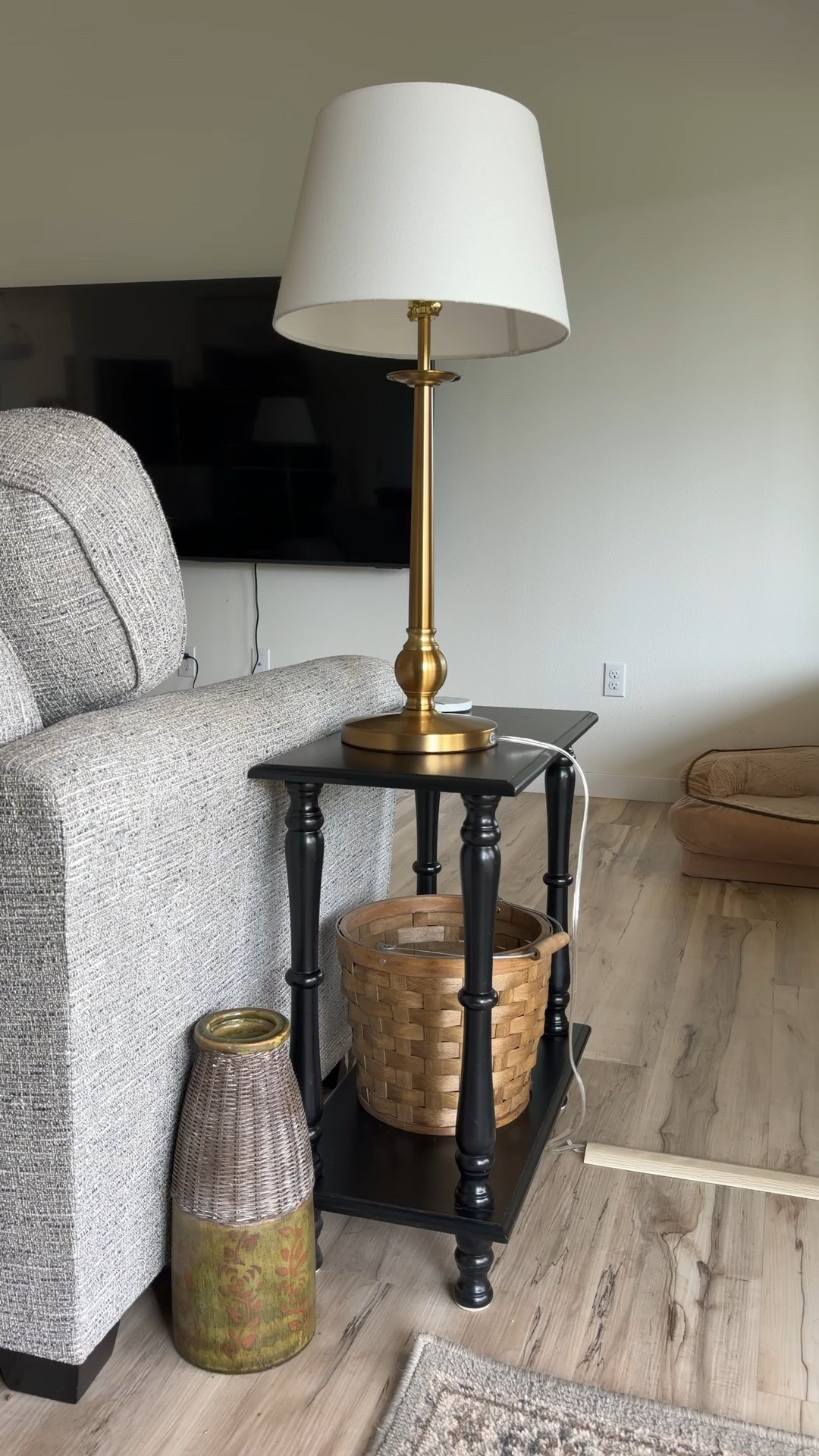 A little corner styling moment ✨ I’m linking the Henn & Hart brushed brass table lamp, the black two tier spindle accent table, and the woven apple basket with handle in this space. These pieces work so well together for a cozy reading nook or living room corner and add a nice mix of warm brass, wood tones, and texture.

#LTKHome #LTKstorytime