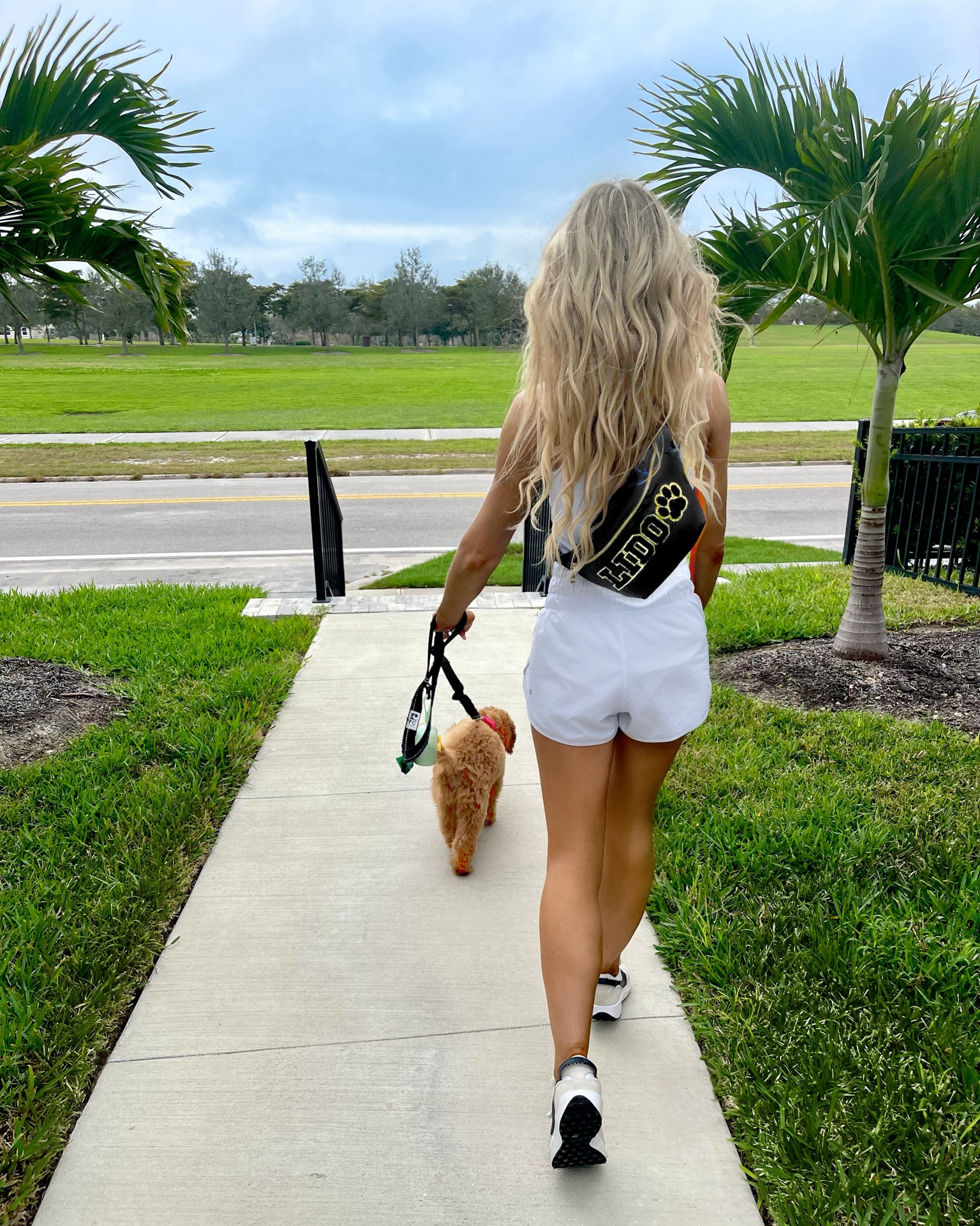 Dog Mom Must Haves: a custom belt bag to wear when walking, comfortable sneakers, + a cute activewear outfit!

Use code: MAURASAVE10 for 10% OFF the belt bag!

I love my custom Disney belt bag so much, I had to get a custom dog belt bag made. This personalized fanny pack helps keep my hands free when I walk my dog outside. The belt bag is large enough to hold all the dog essentials (treats, a toy, bags) + my phone. I chose to customize the bag with my pet's name. There are lots of options + colors to choose from when choosing the letter patches for your custom belt bag. This makes a great gift for the dog lover, Disney lover, busy girl/ mom on the go, fitness lover, or traveler.

I’m wearing white Lululemon-inspired running shorts that are high-waisted and have a built-in liner. I styled this with a white sports tank top and my favorite Nike sneakers  

#LTKTravel #LTKPets #LTKFitness